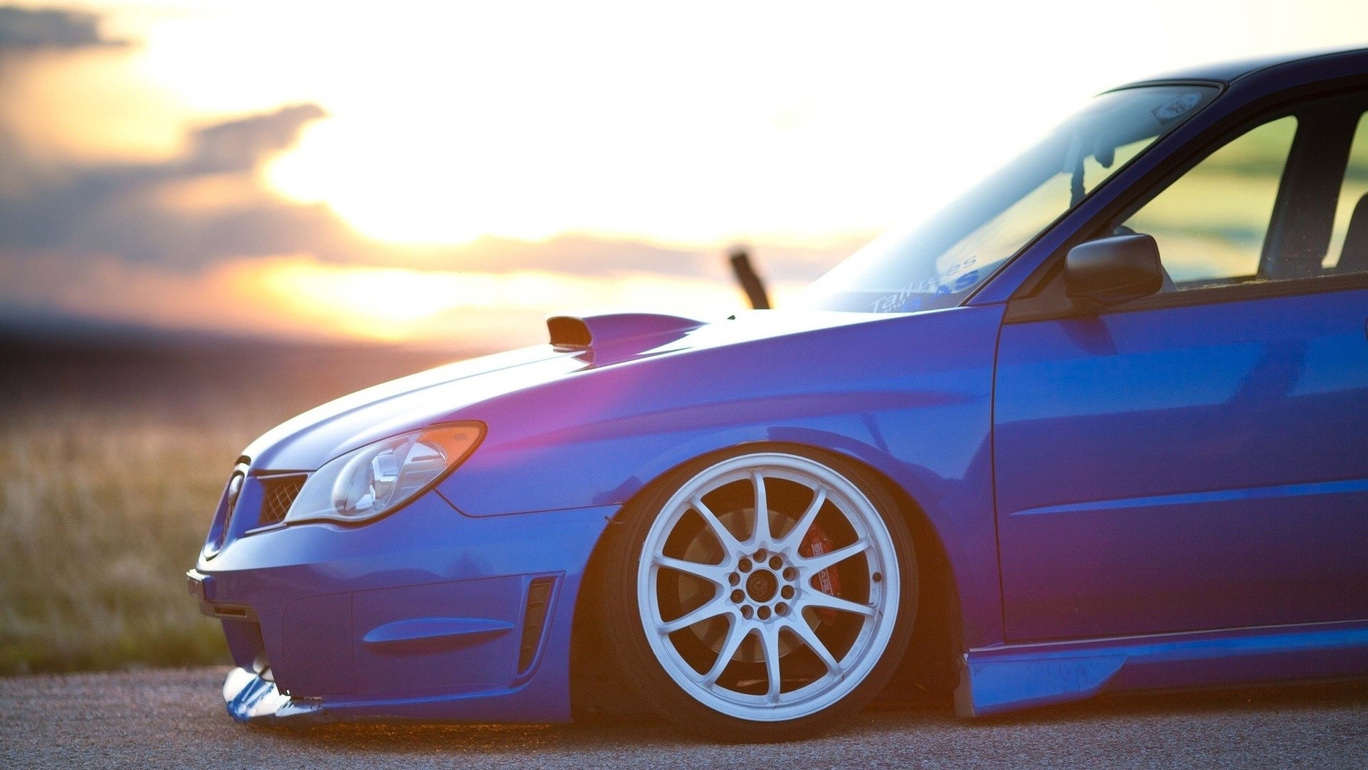 Blue Subaru Impreza WRX STI with custom wheels HD Wallpaper