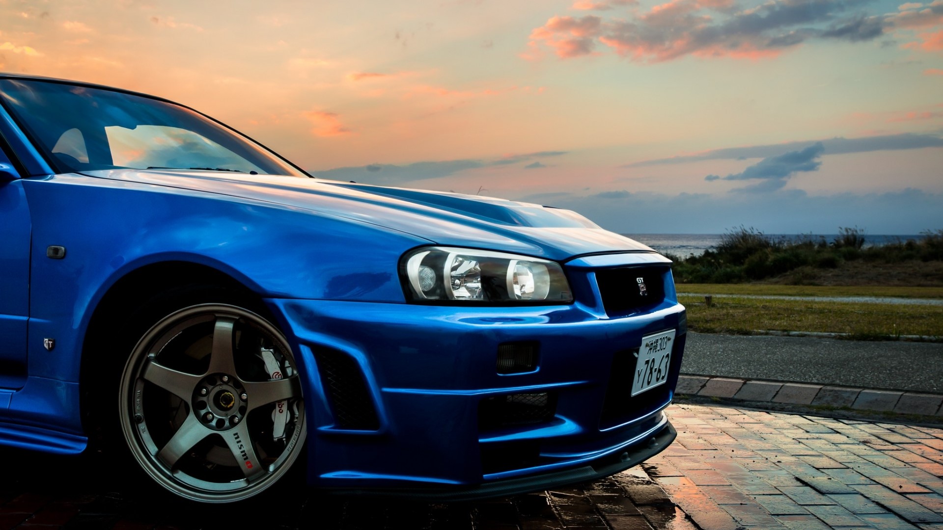 Blue Nissan Skyline GT-R R34 at Sunset HD Wallpaper