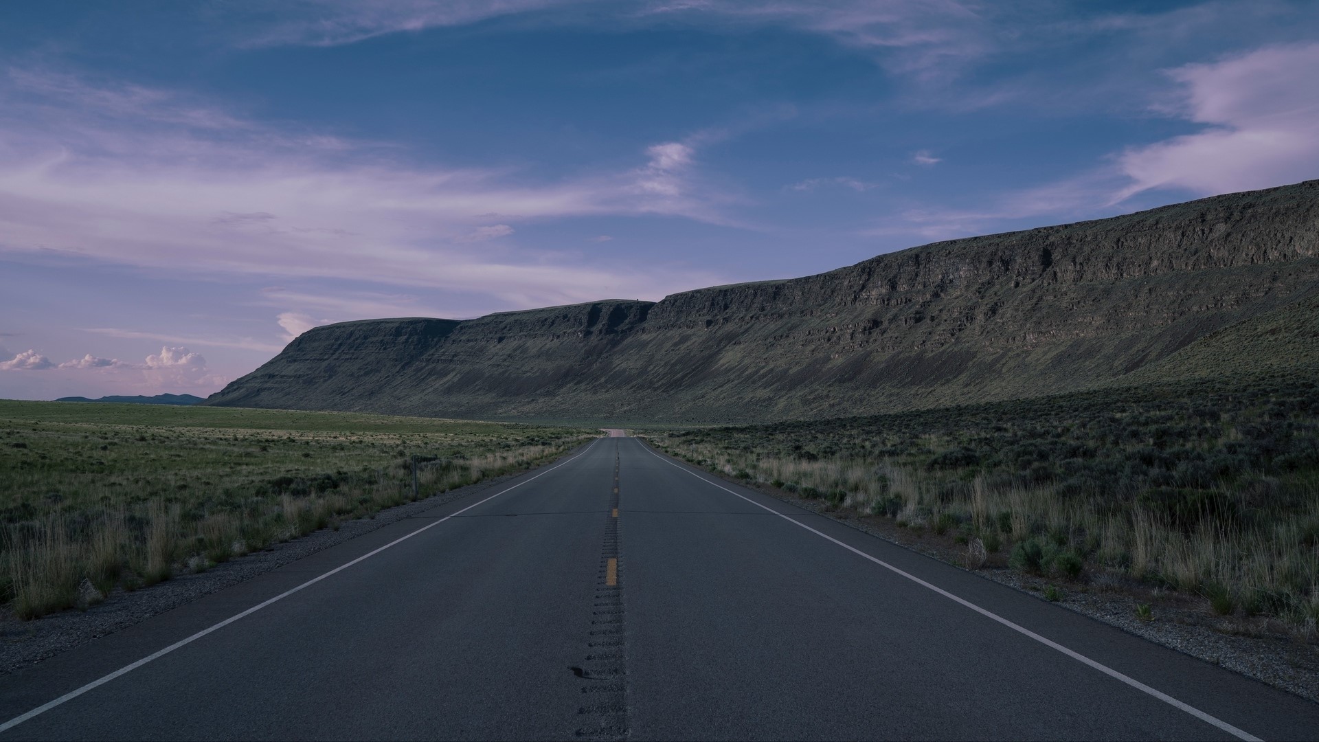 Empty Road Leading to a Mountain Range HD Wallpaper