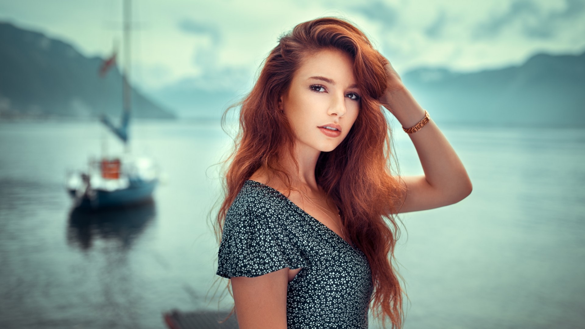 Woman with red hair by the sea with a sailboat HD Wallpaper