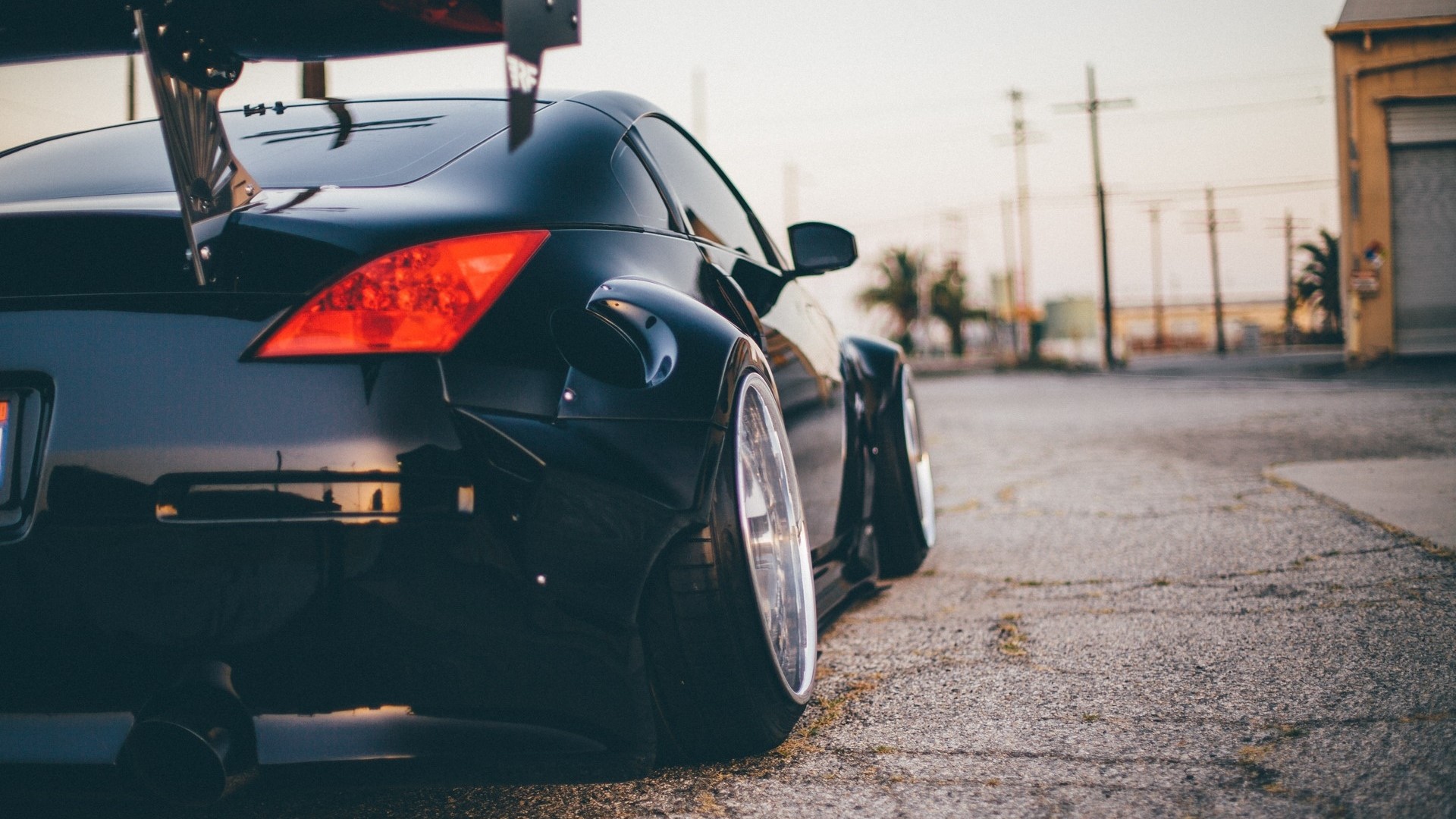 Black Nissan 350Z with large rear spoiler HD Wallpaper
