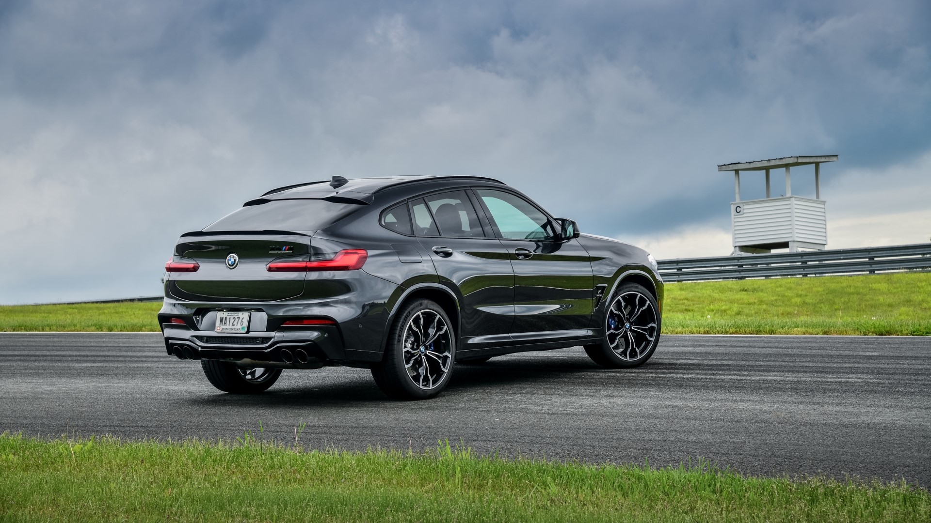 BMW X4M F98 on a racetrack HD Wallpaper