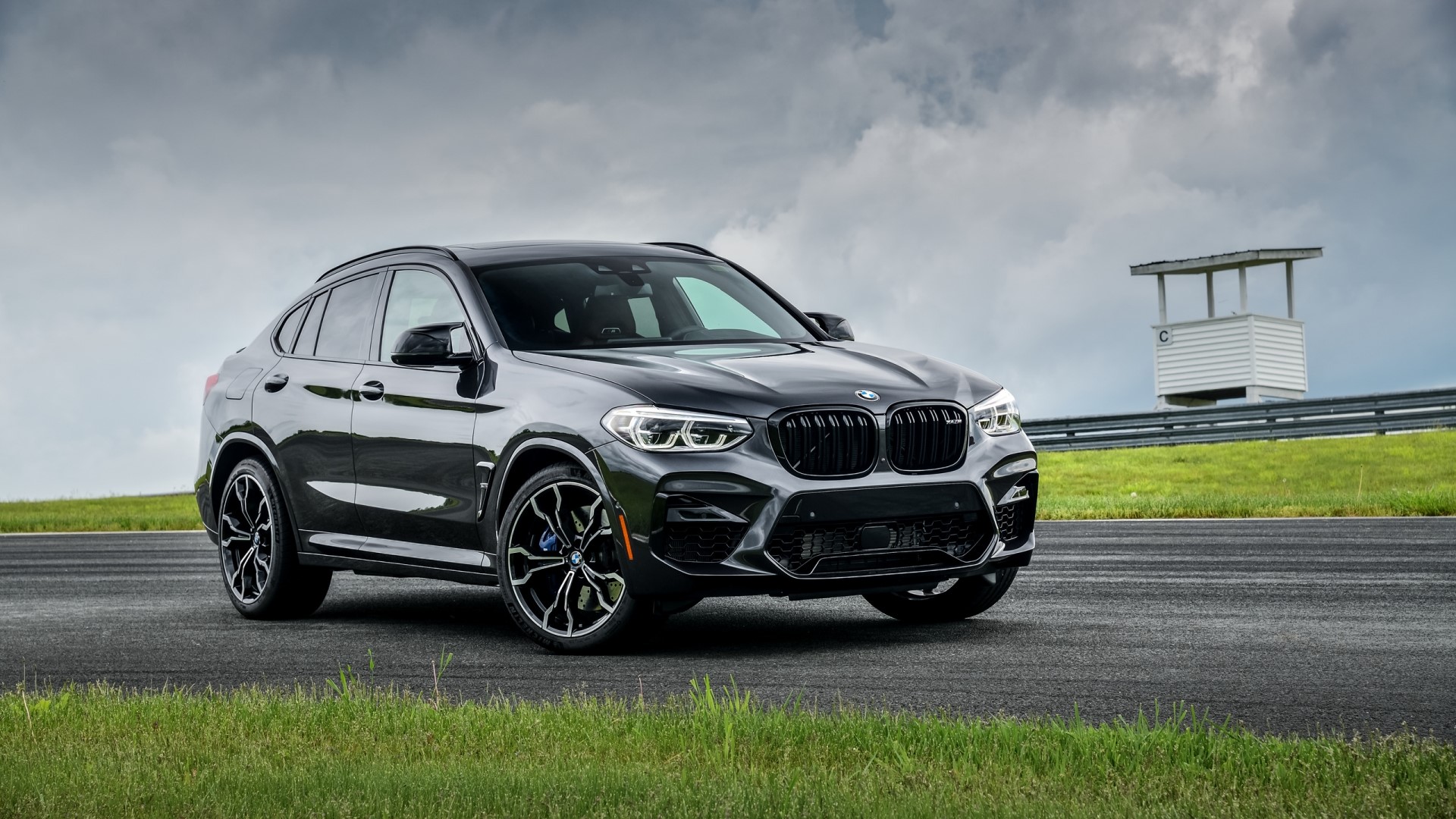 Black BMW X4M F98 on a Race Track HD Wallpaper