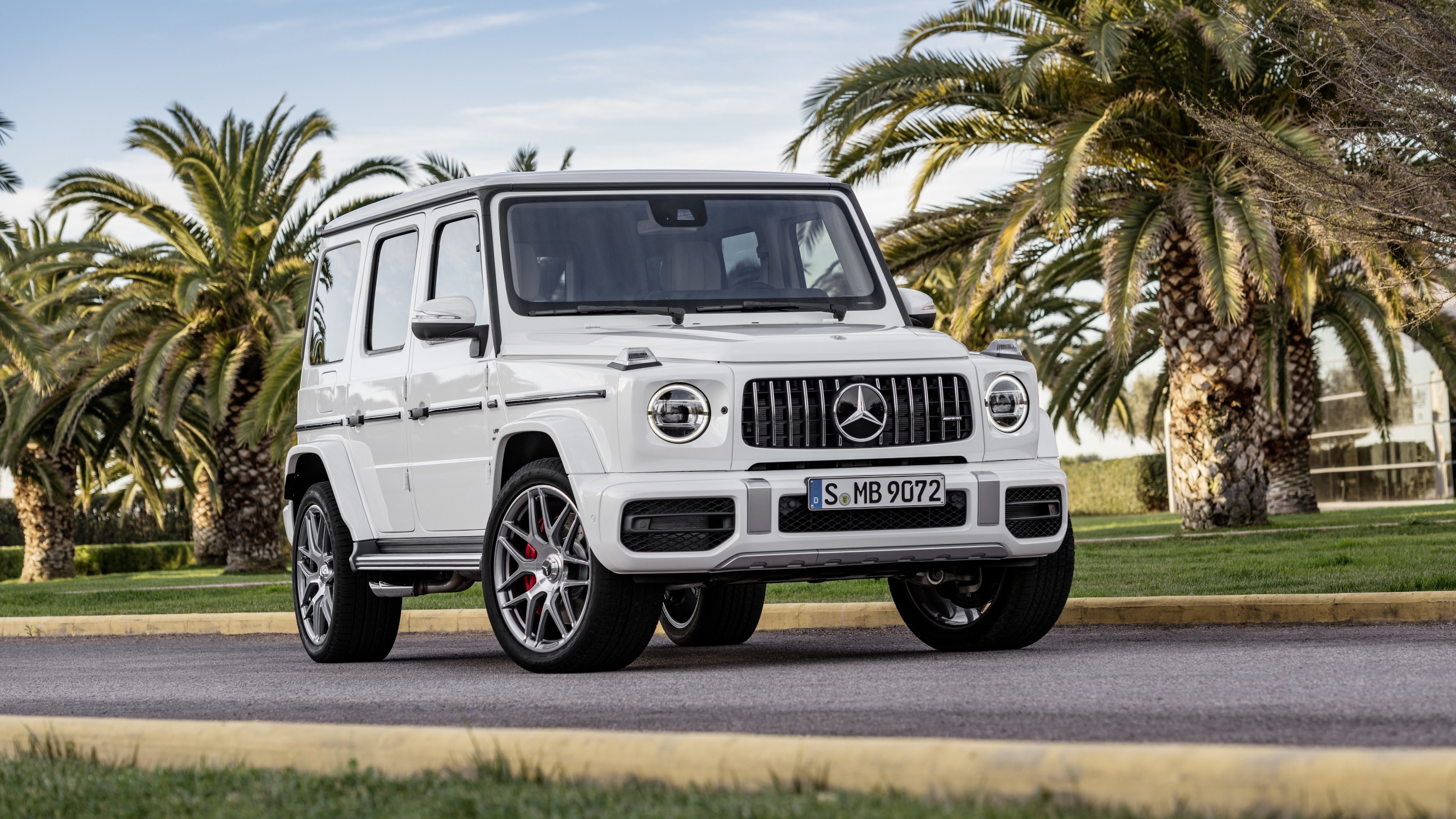 4K Mercedes G-Wagon on Road with Palm Trees HD Wallpaper