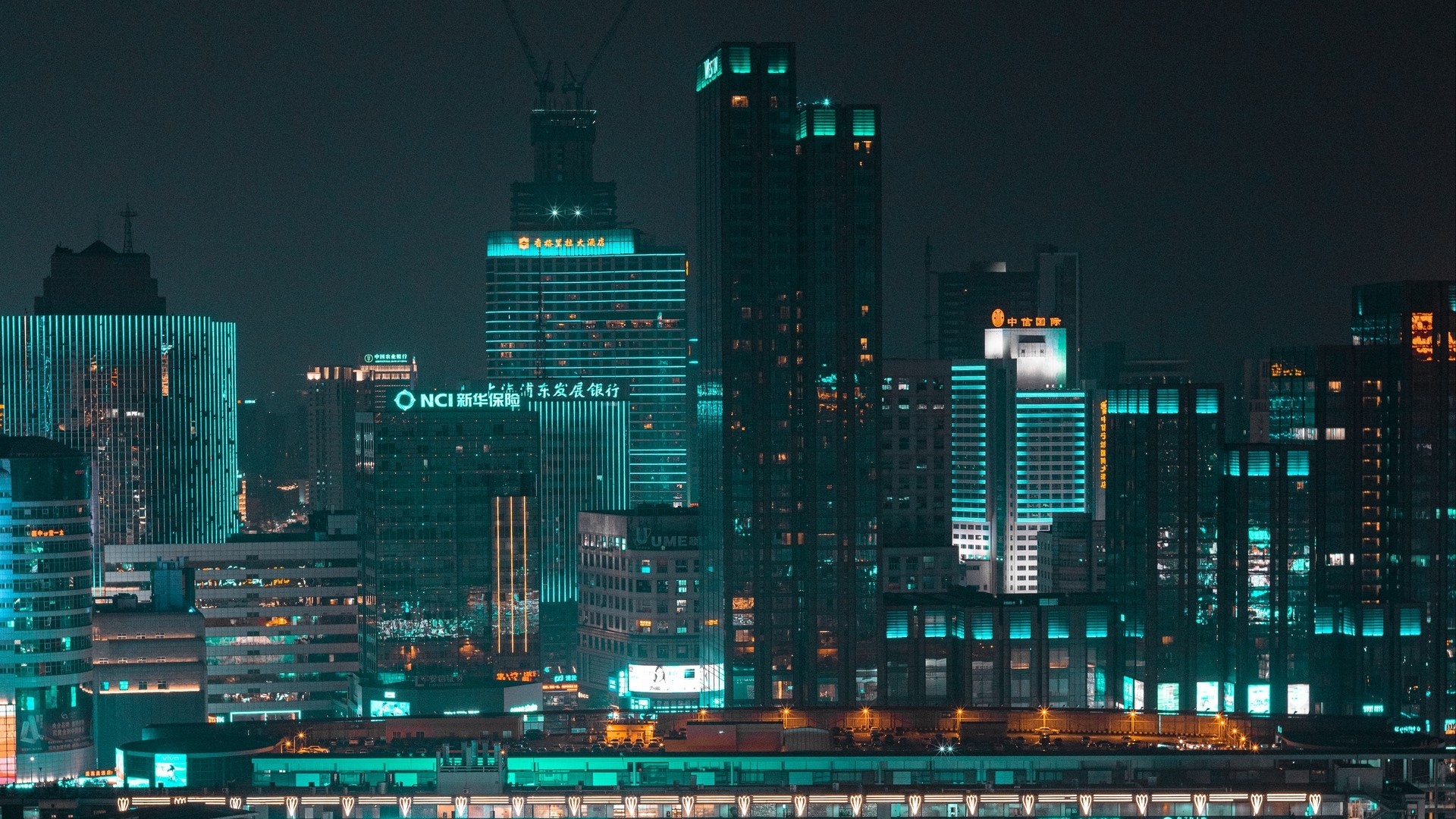Night cityscape with illuminated skyscrapers HD Wallpaper