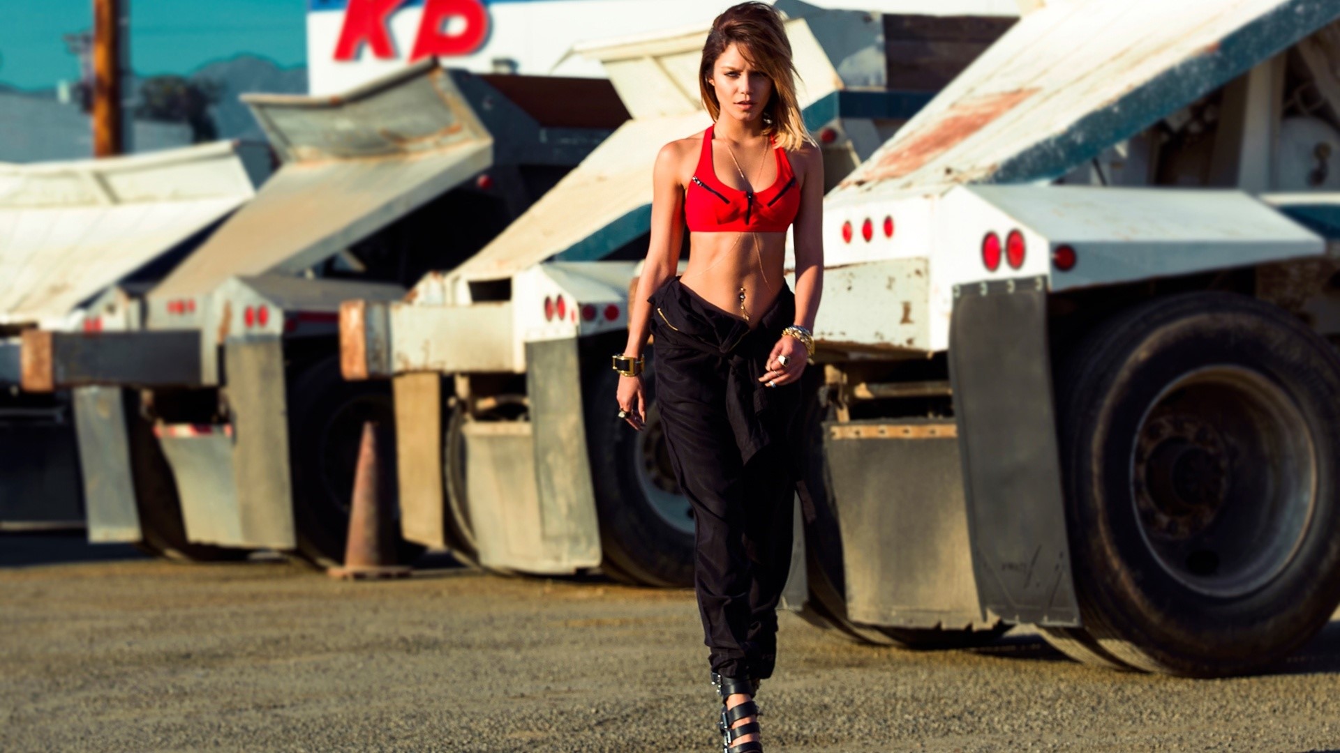 Vanessa Hudgens in a red top and black pants HD Wallpaper