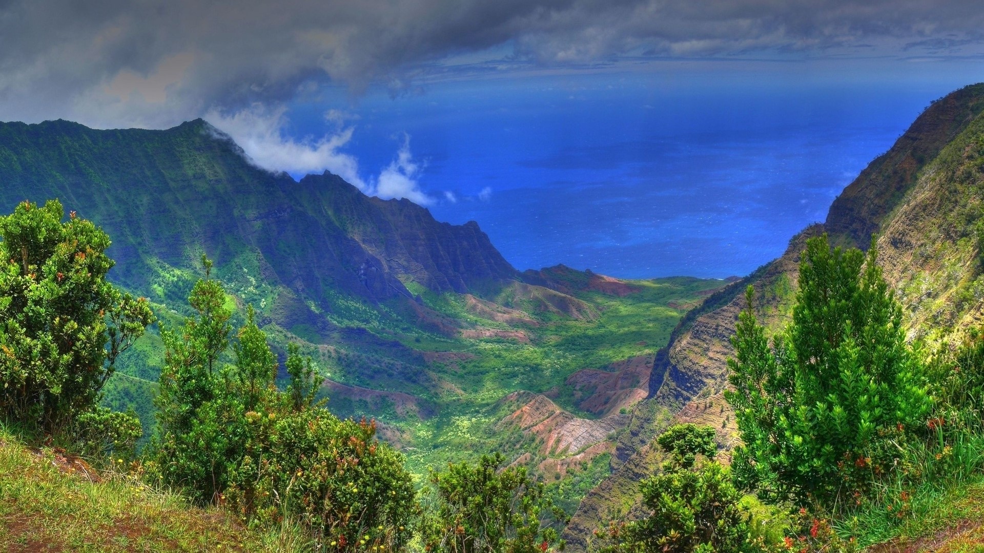 Mountains by the blue sea HD Wallpaper