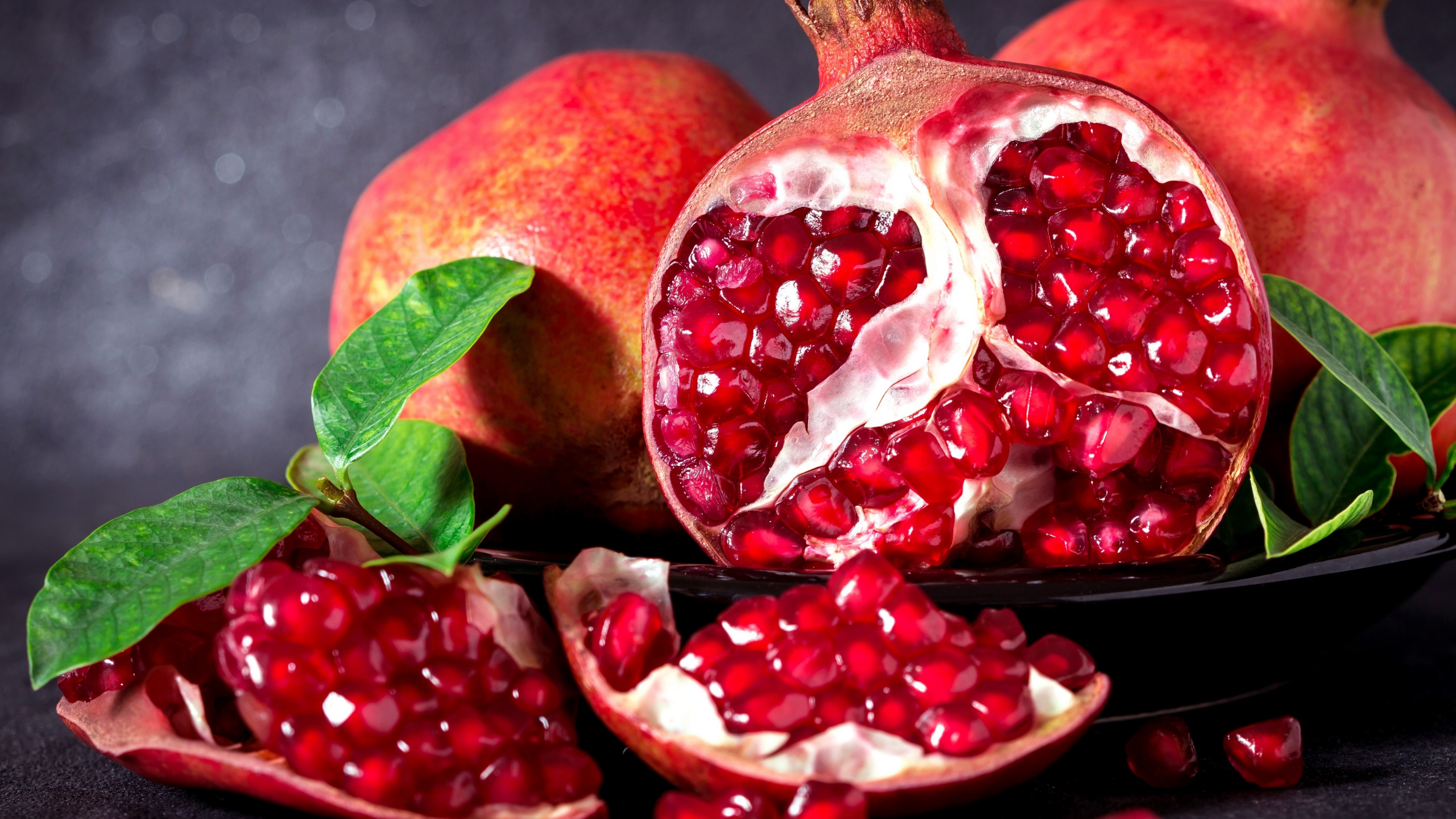 4K Pomegranates with Leaves HD Wallpaper