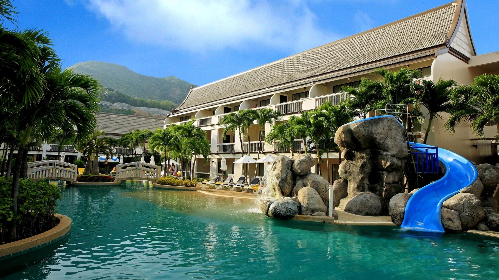 Resort with swimming pool and water slide HD Wallpaper