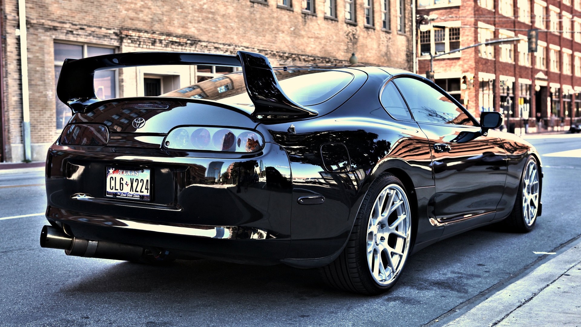 Black Toyota Supra with large spoiler HD Wallpaper