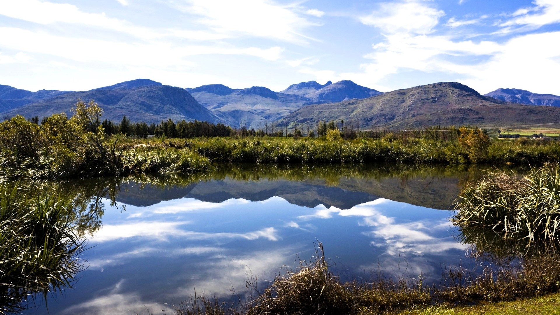 Pond reflection of mountains and sky HD Wallpaper