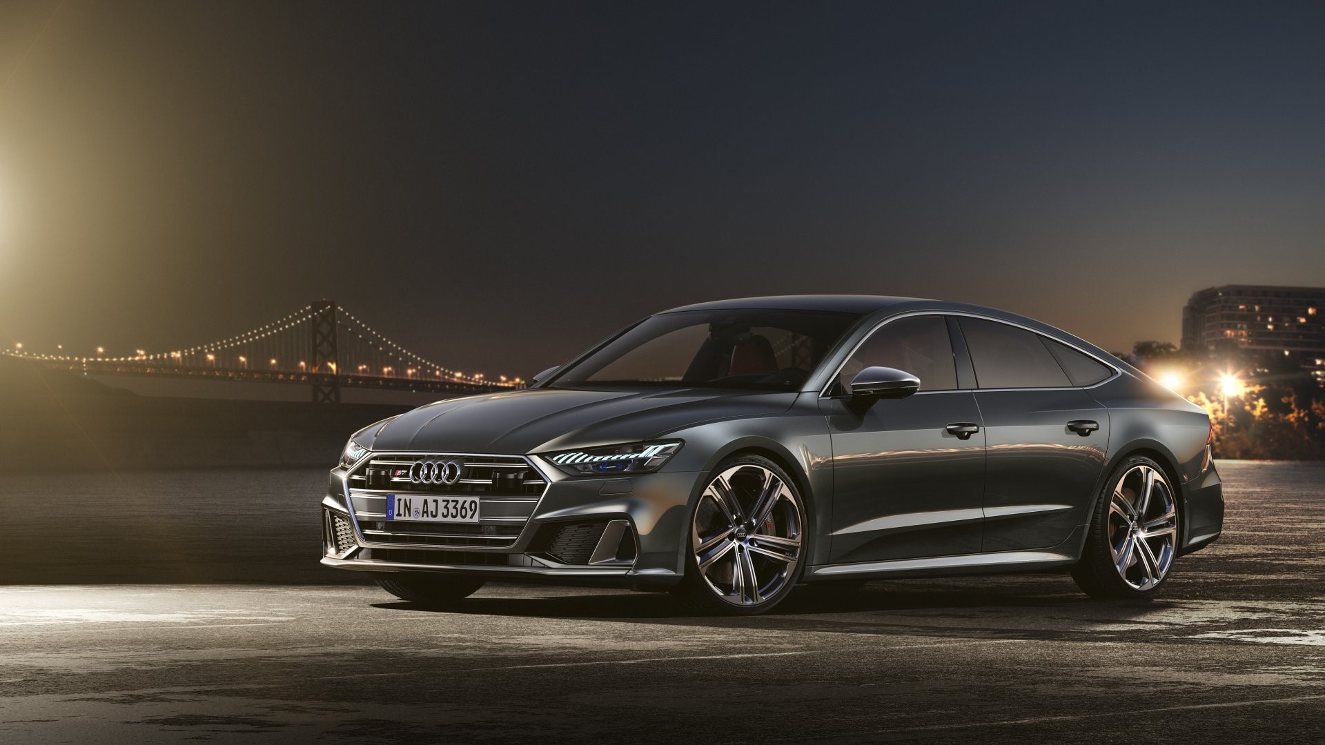 Audi S7 parked by a bridge at night HD Wallpaper