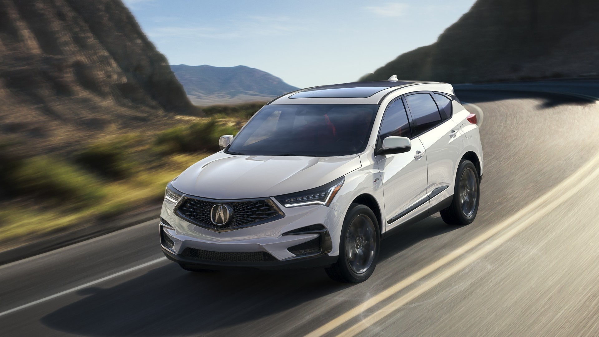 White Acura RDX driving on a winding road HD Wallpaper
