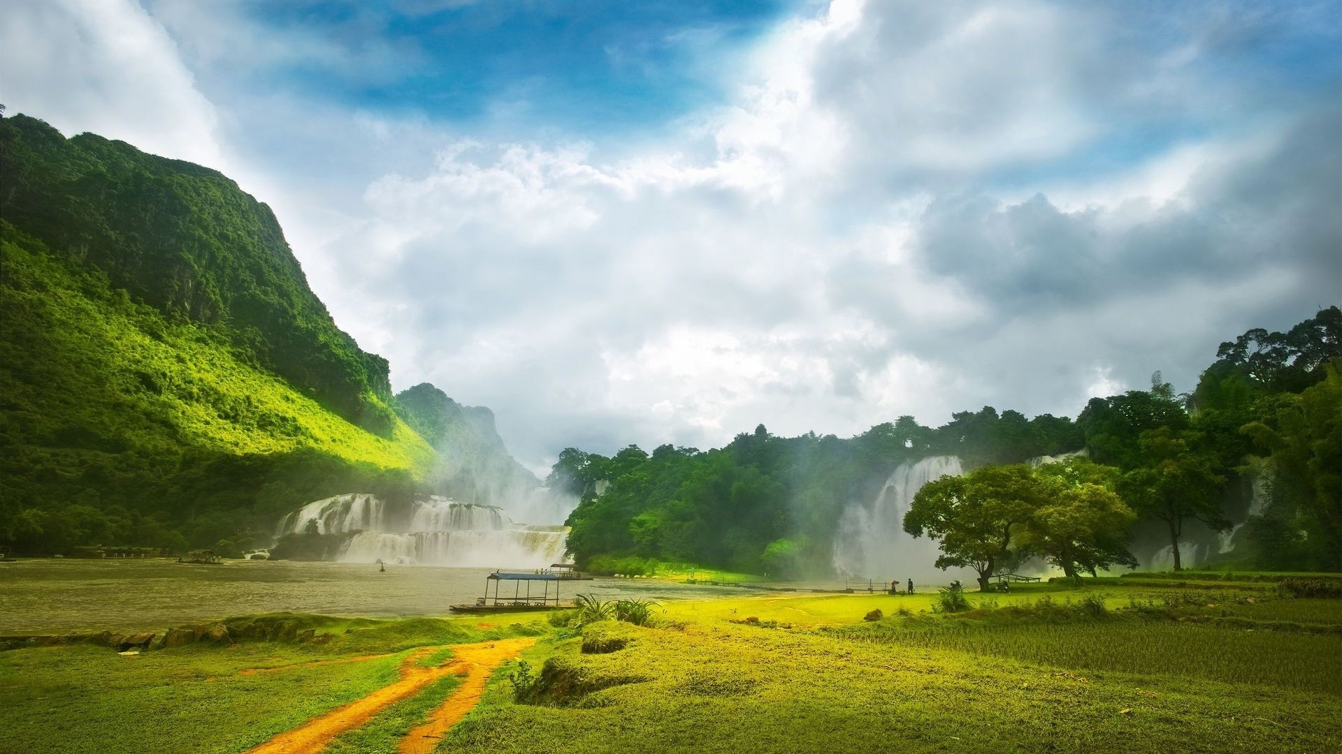 Couple of waterfalls in a green landscape HD Wallpaper