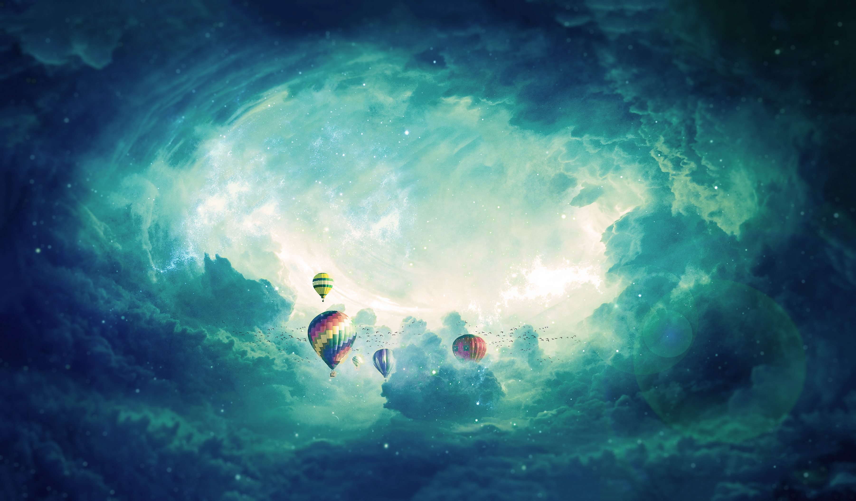 Hot air balloons in a cloudy sky HD Wallpaper