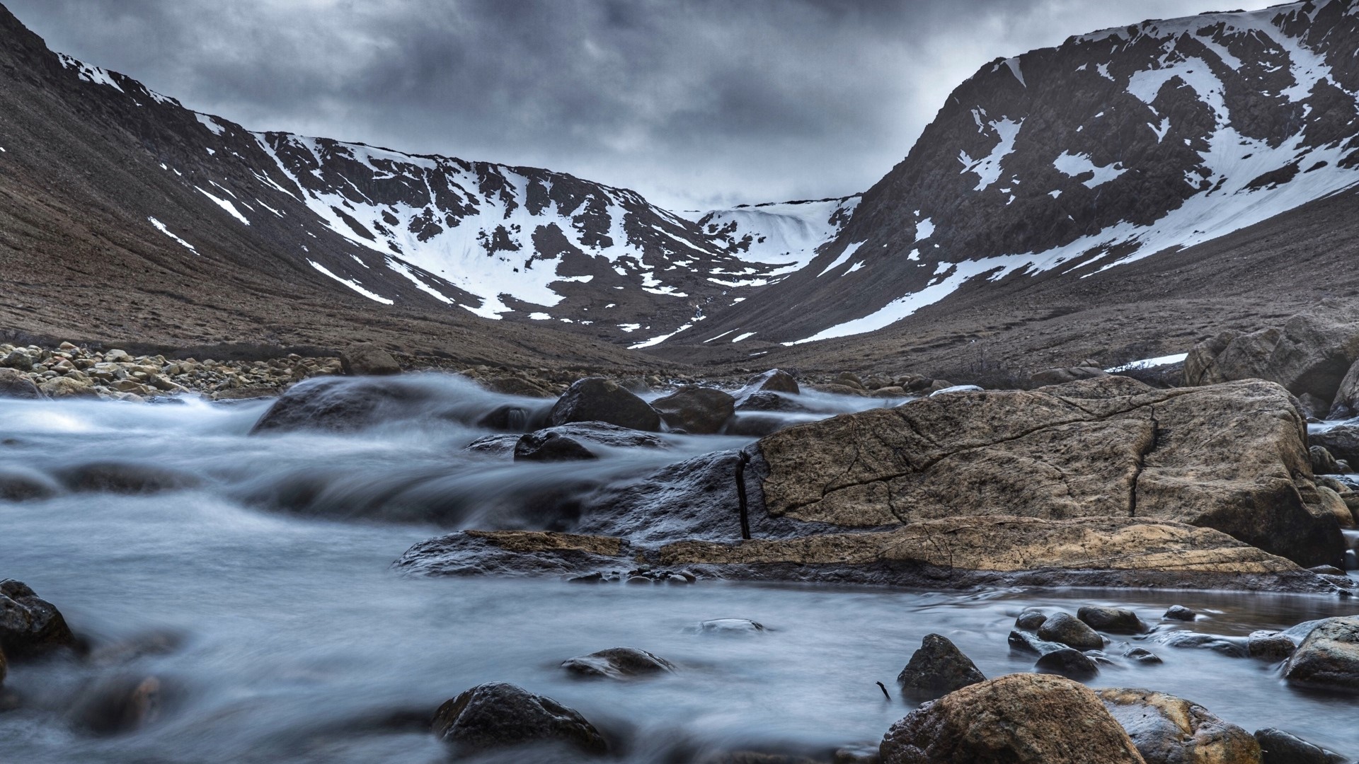 Mountain valley with a river and snow HD Wallpaper