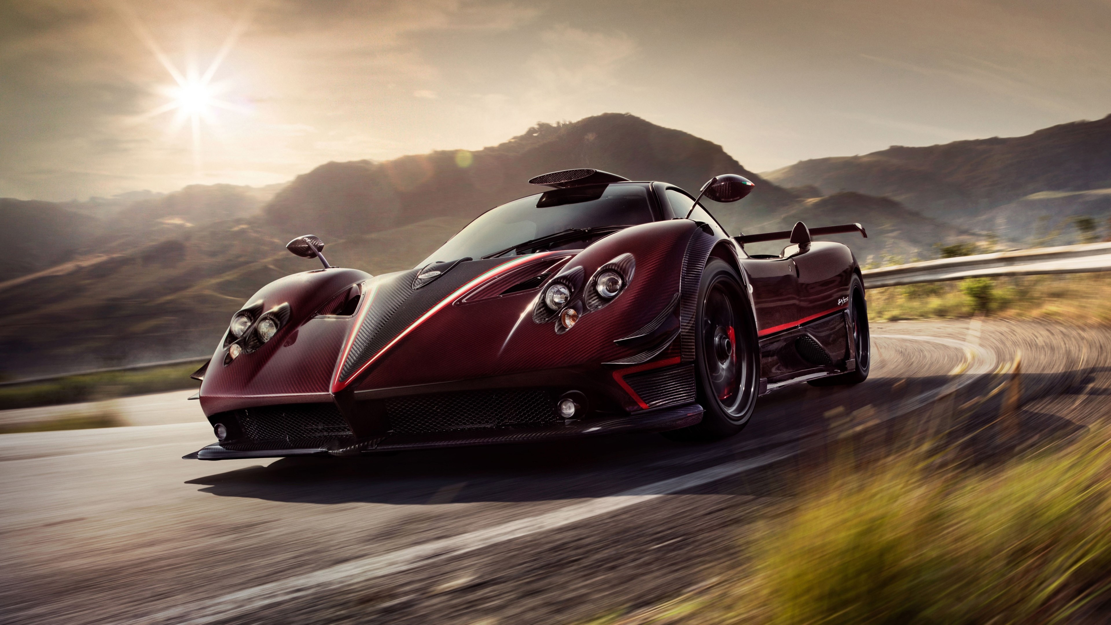 Pagani Zonda R driving on a mountain road HD Wallpaper