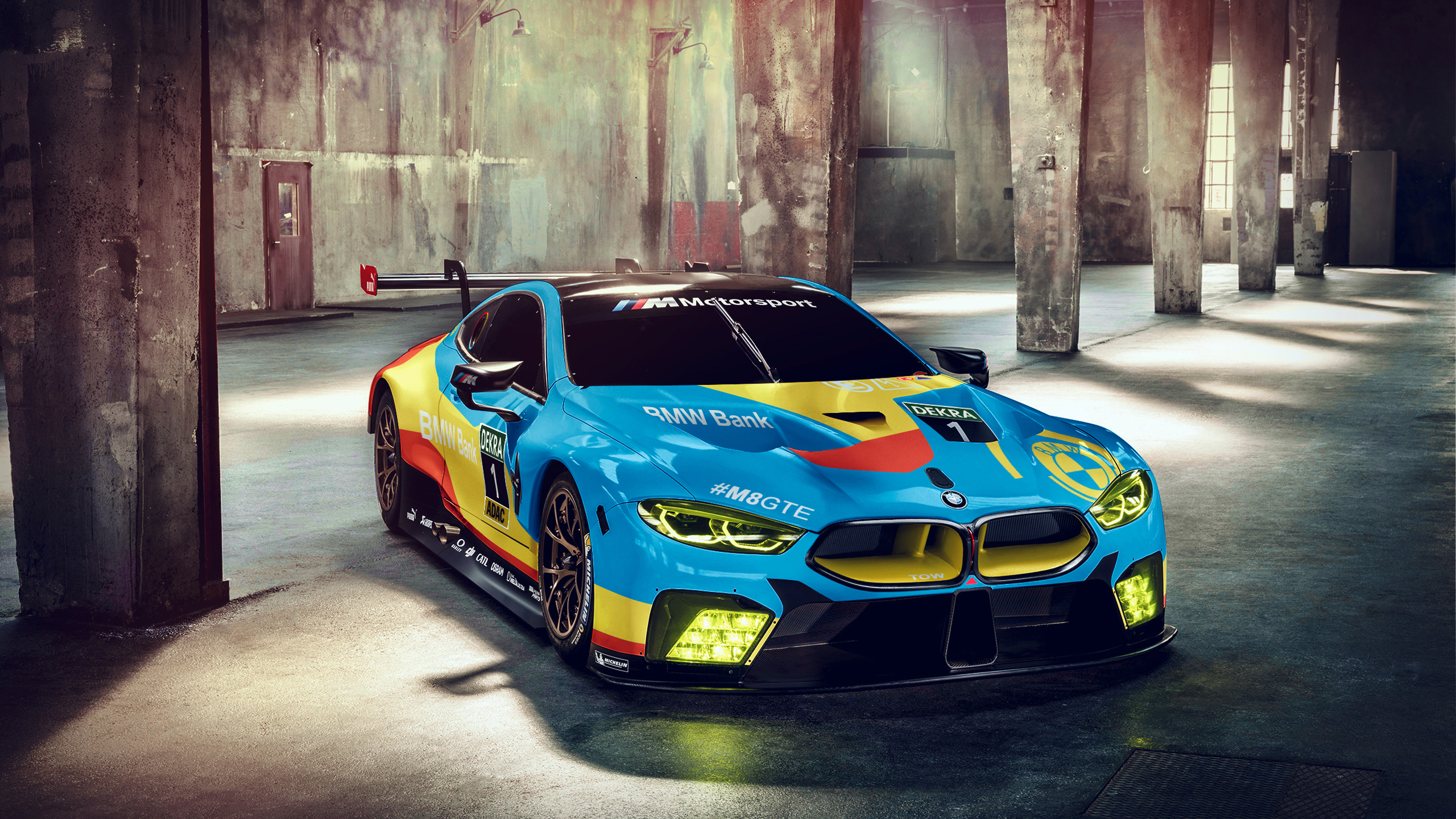 BMW M8 GTE race car in a warehouse HD Wallpaper