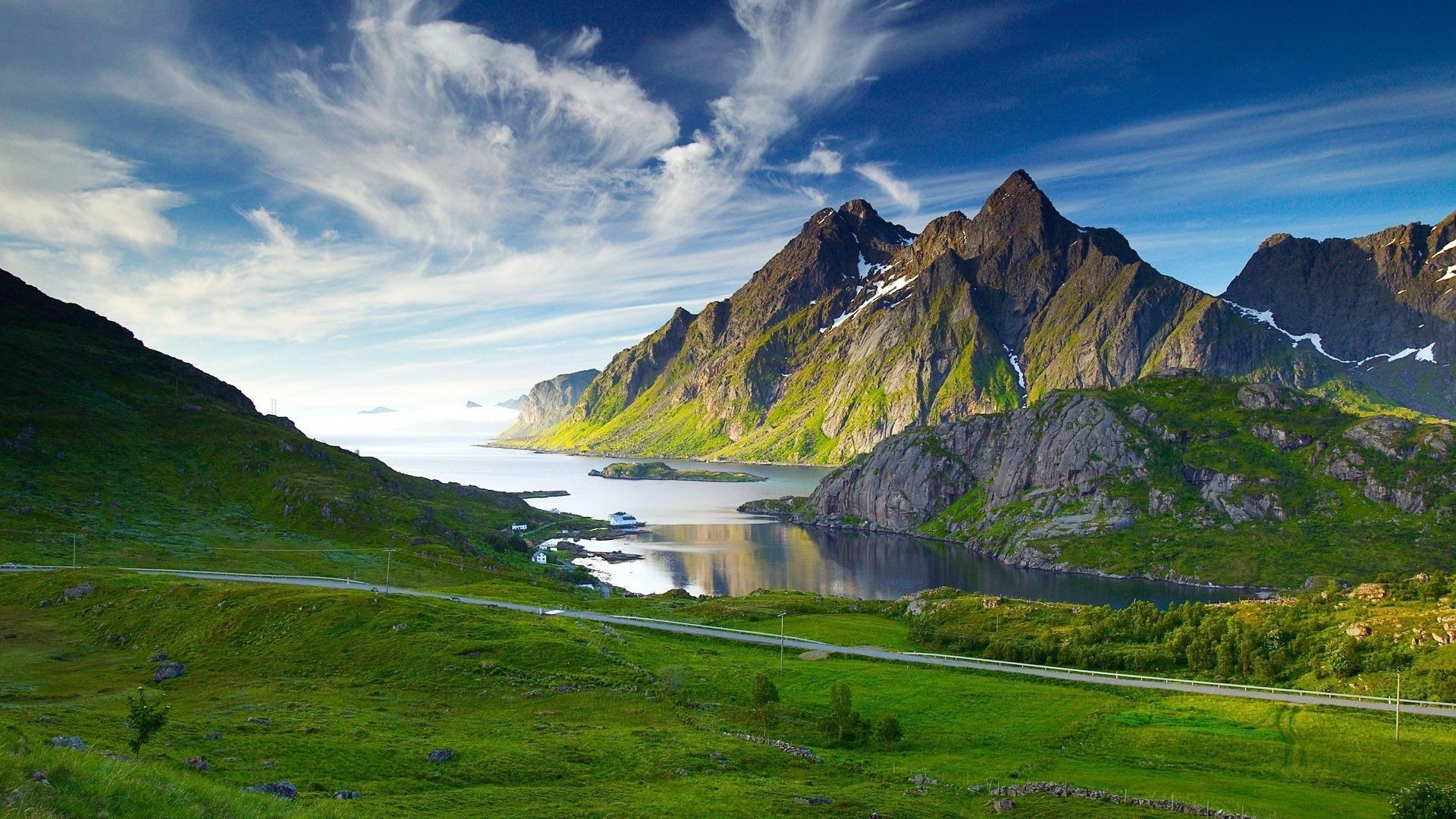 Mountain landscape with a bay and a road HD Wallpaper