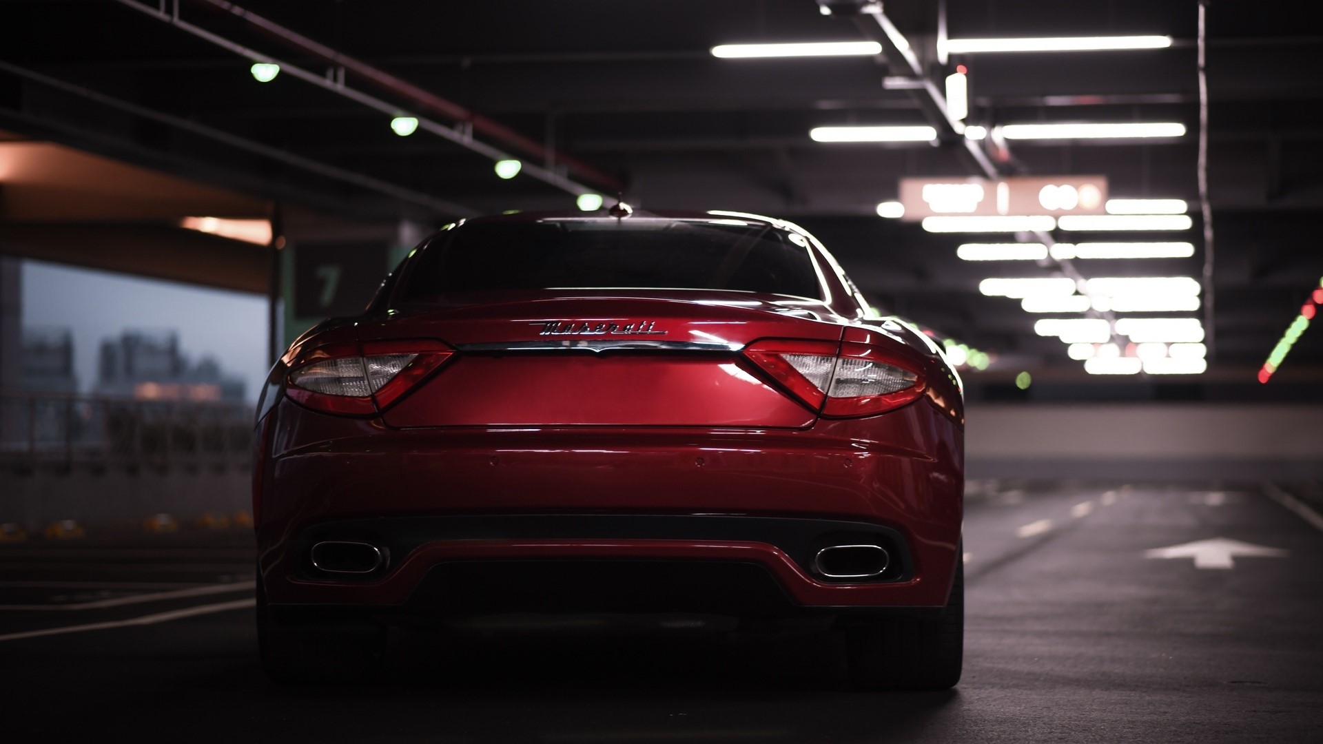 Red Maserati GranTurismo in parking garage HD Wallpaper
