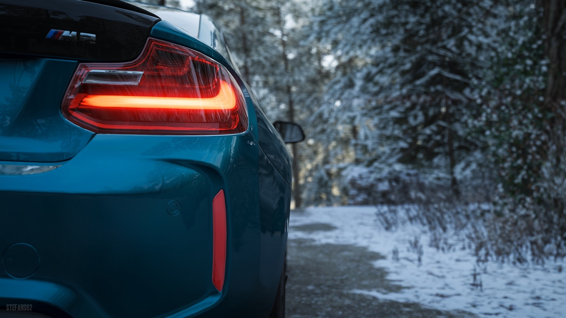 BMW M2 in a Snowy Forest HD Wallpaper