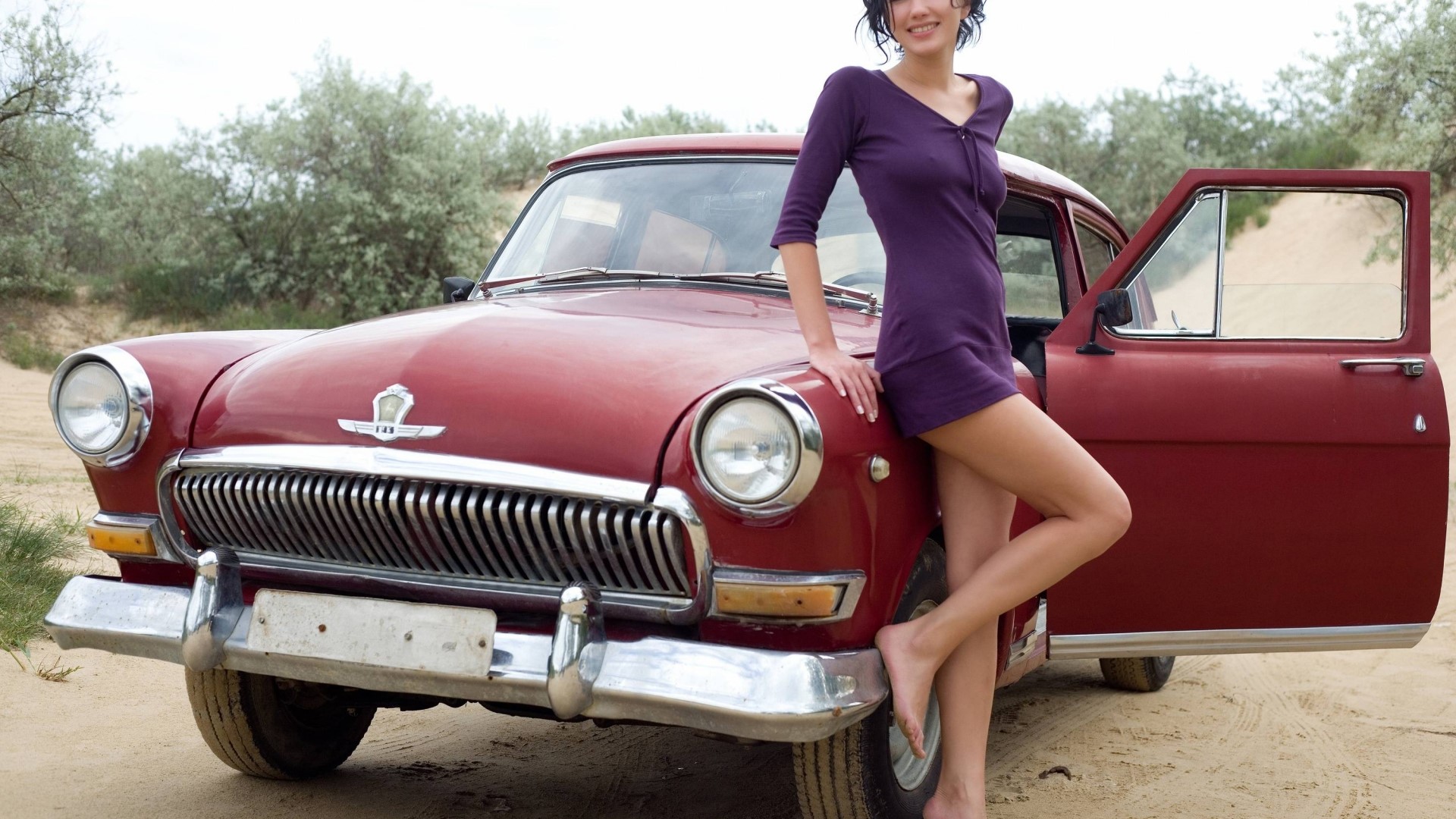 Woman in purple dress with vintage car HD Wallpaper