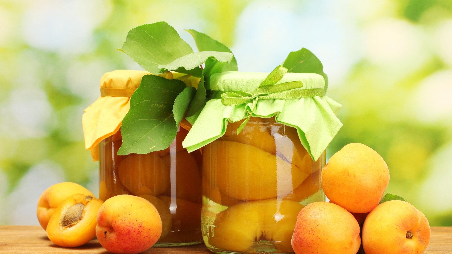 Apricot compote in jars with fresh apricots HD Wallpaper