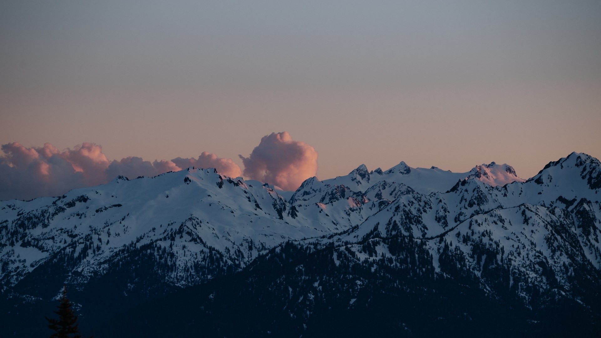 Snow-capped mountains at sunset with clouds HD Wallpaper