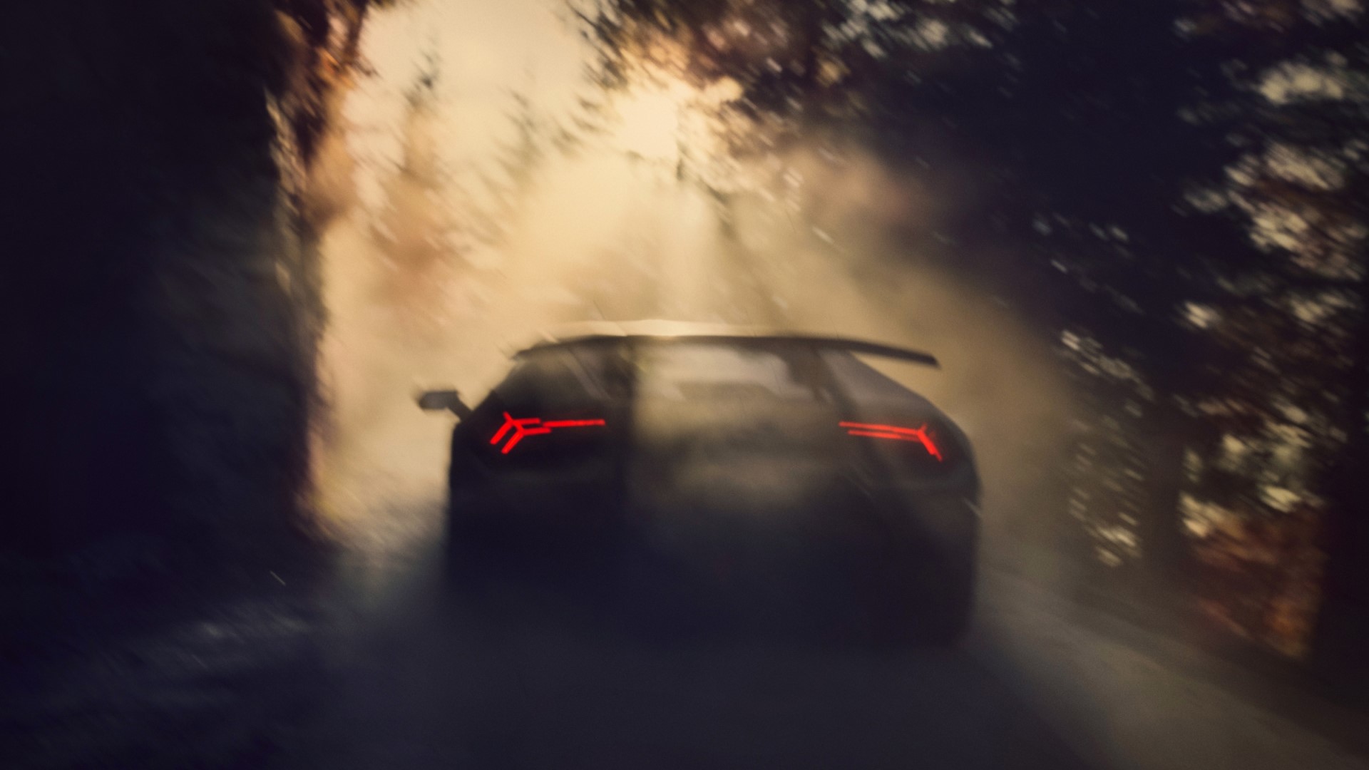 Lamborghini Huracan Performante driving on a dusty road HD Wallpaper