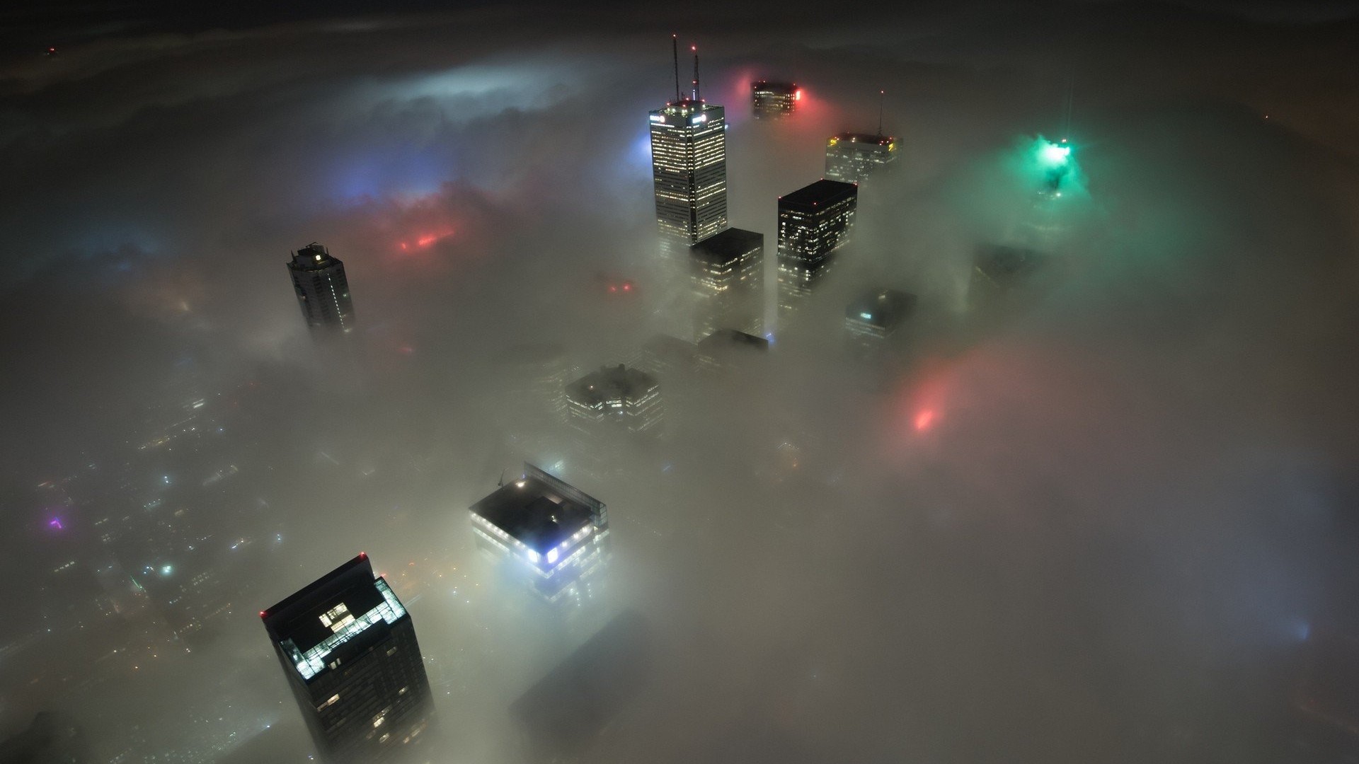 Toronto skyscrapers shrouded in fog at night HD Wallpaper
