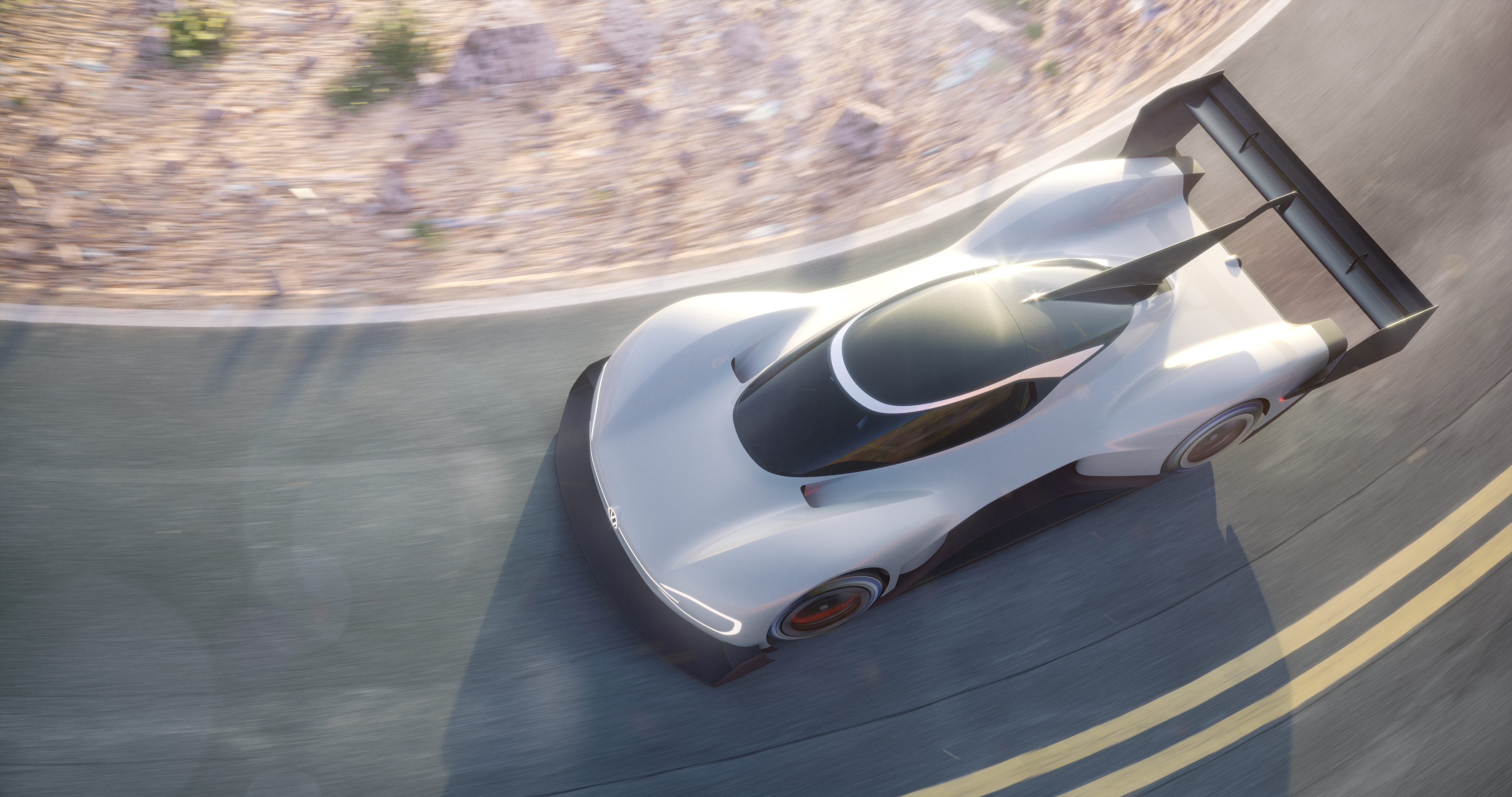 Volkswagen I.D. R electric race car on a road HD Wallpaper