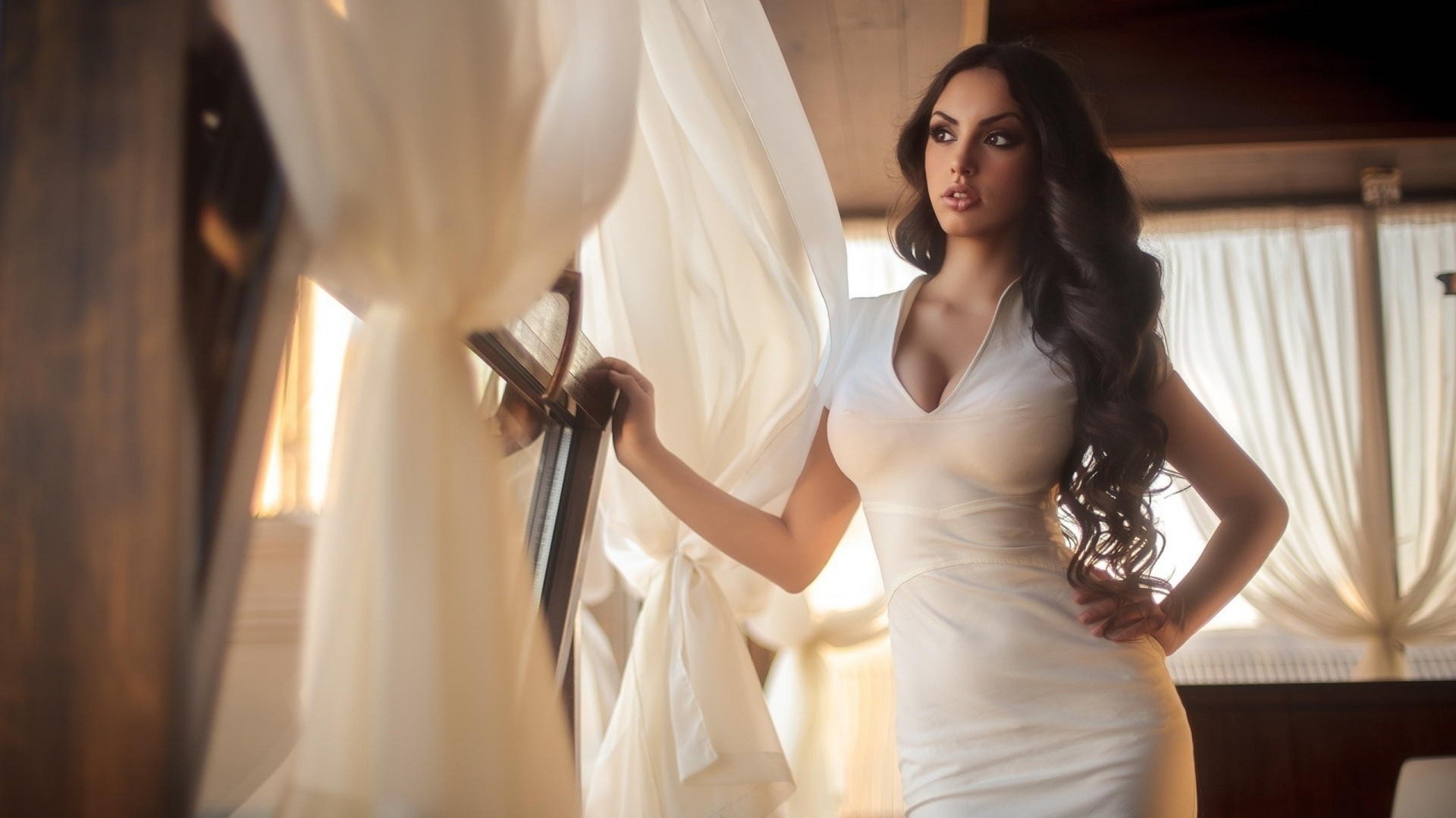 Model in white dress by window HD Wallpaper