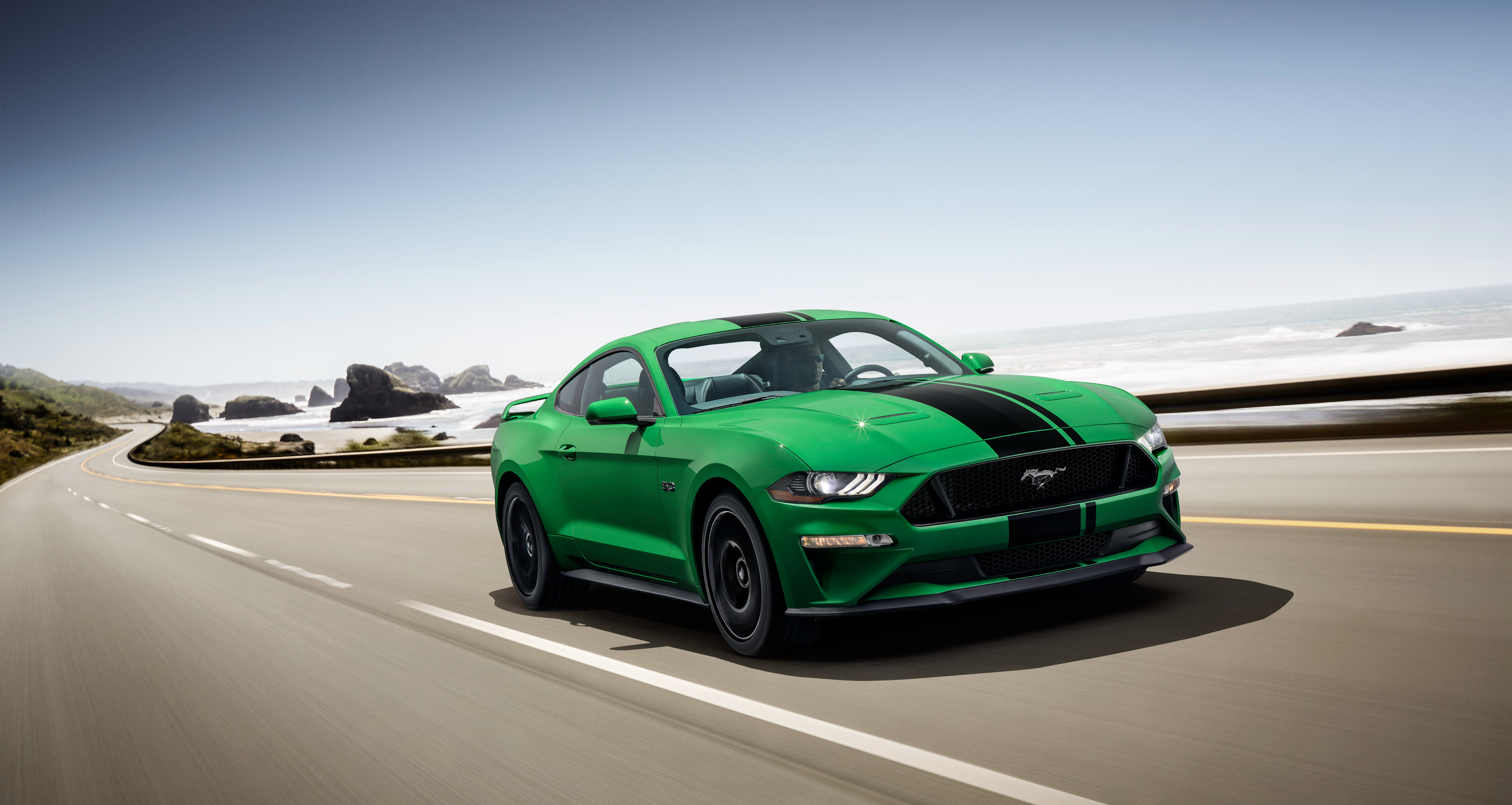 Green Ford Mustang GT Fastback on Coastal Road 4K HD Wallpaper