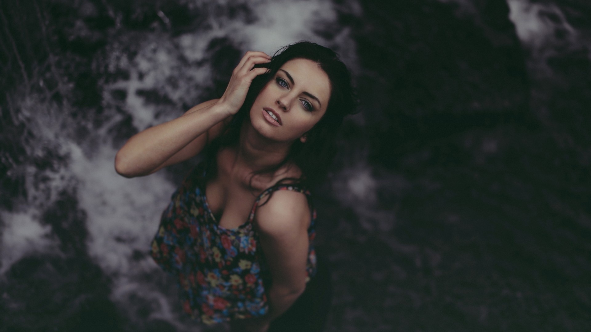 Woman looking up from water HD Wallpaper