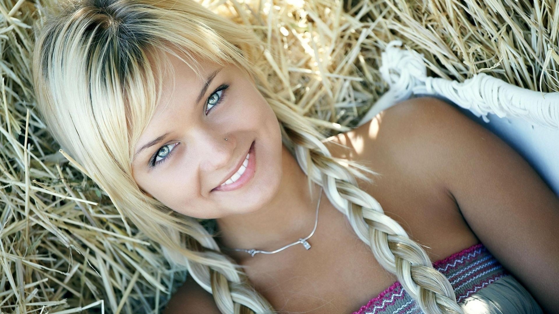 Cute blonde model lying in hay HD Wallpaper