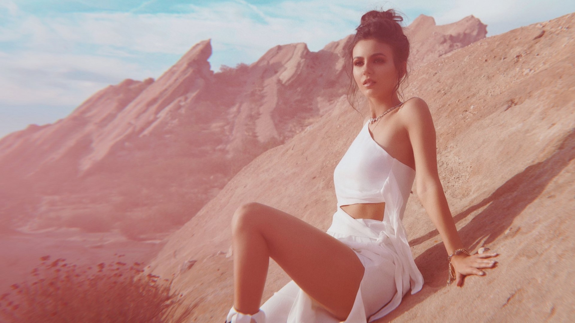 Victoria Justice in a white dress in a desert landscape HD Wallpaper