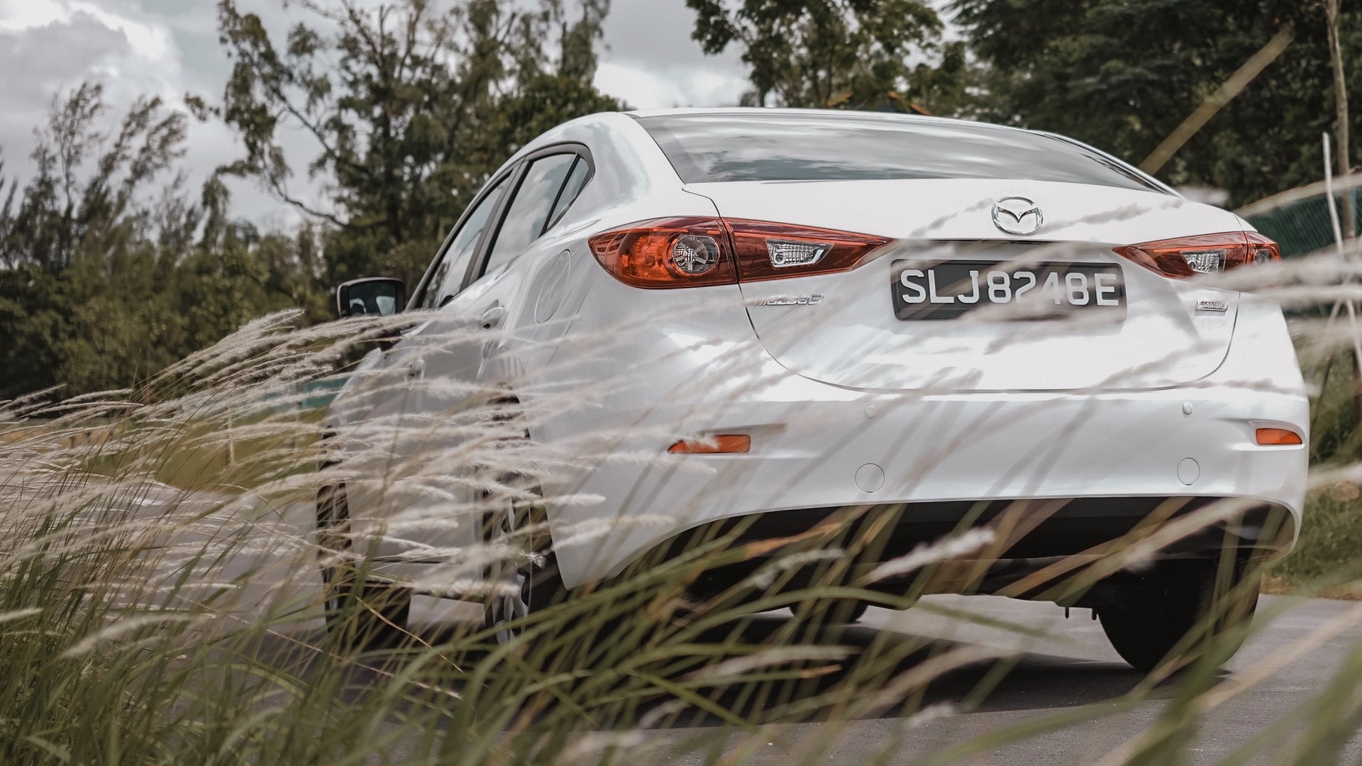 White Mazda 3 Sedan with License Plate SLJ8248E HD Wallpaper