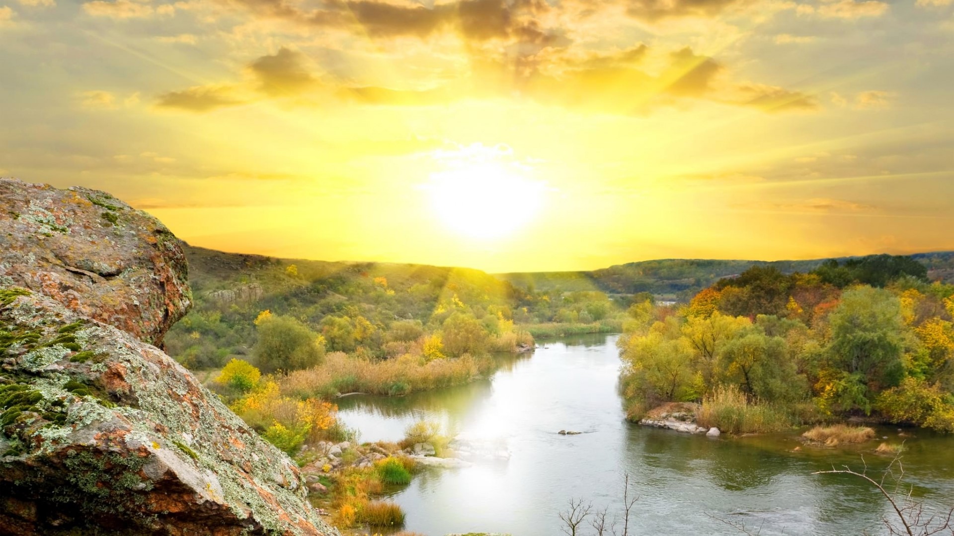 Sunrise over a river and rocky landscape HD Wallpaper