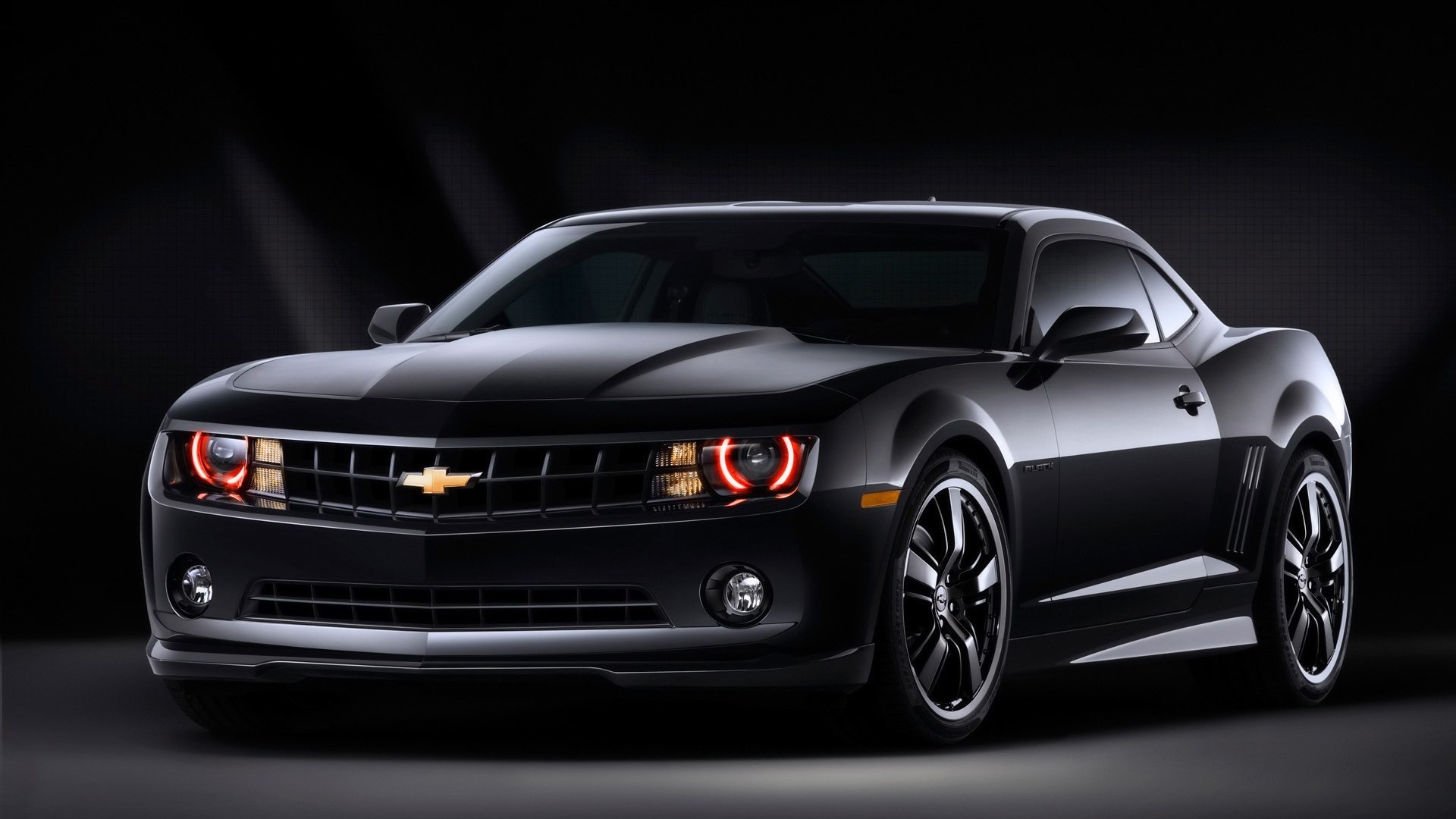 Black Chevrolet Camaro with red halo headlights HD Wallpaper