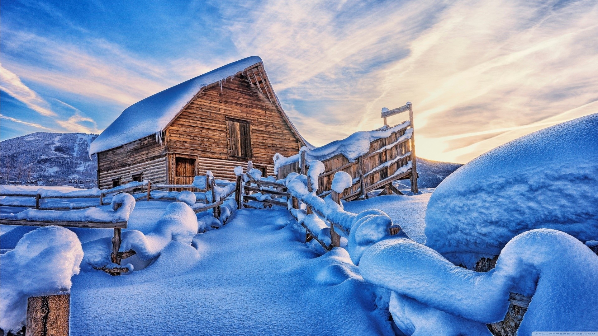 Snowy barn and fence in winter landscape HD Wallpaper