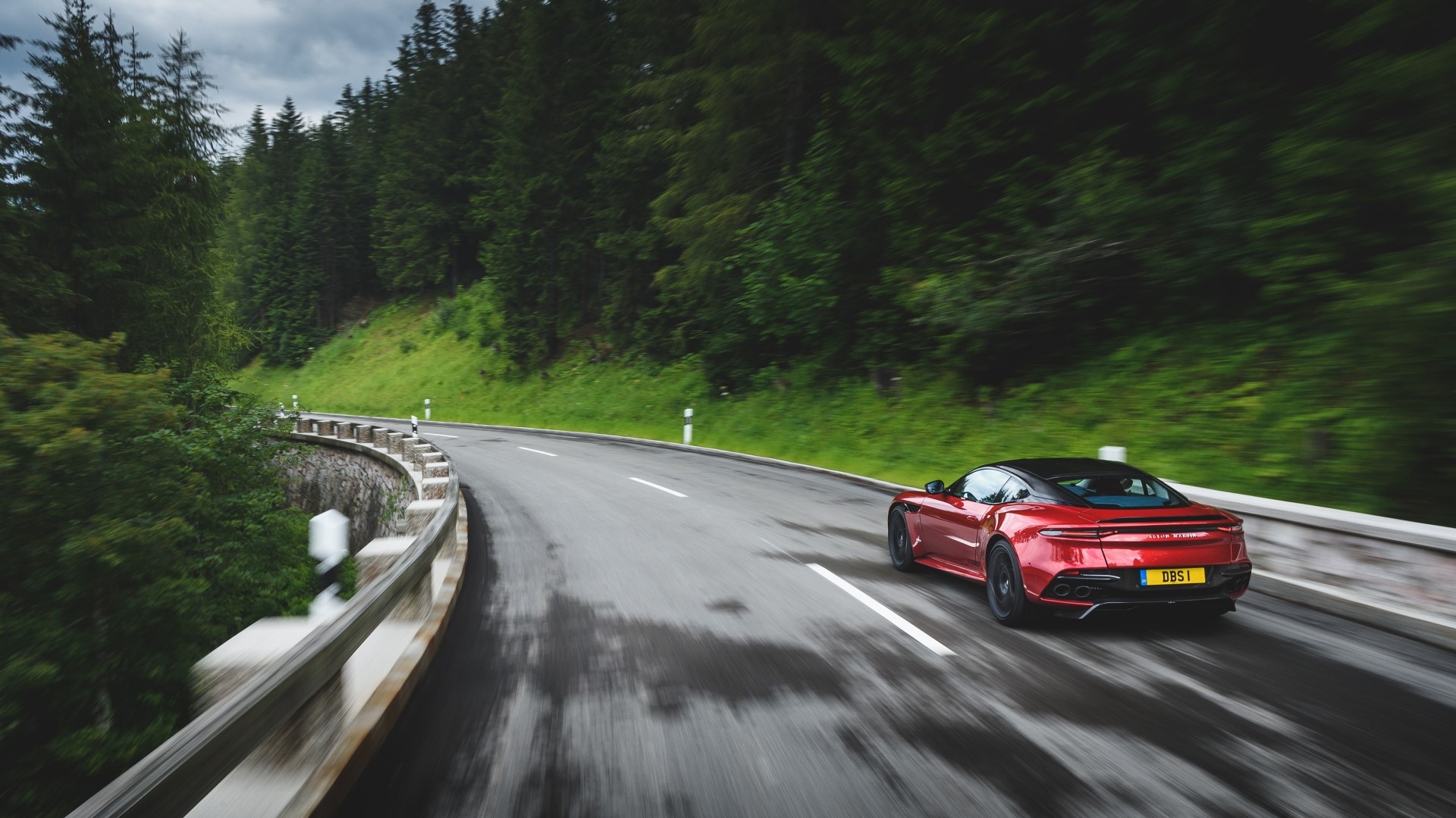Red Aston Martin DBS Supercar on a Wet Road HD Wallpaper