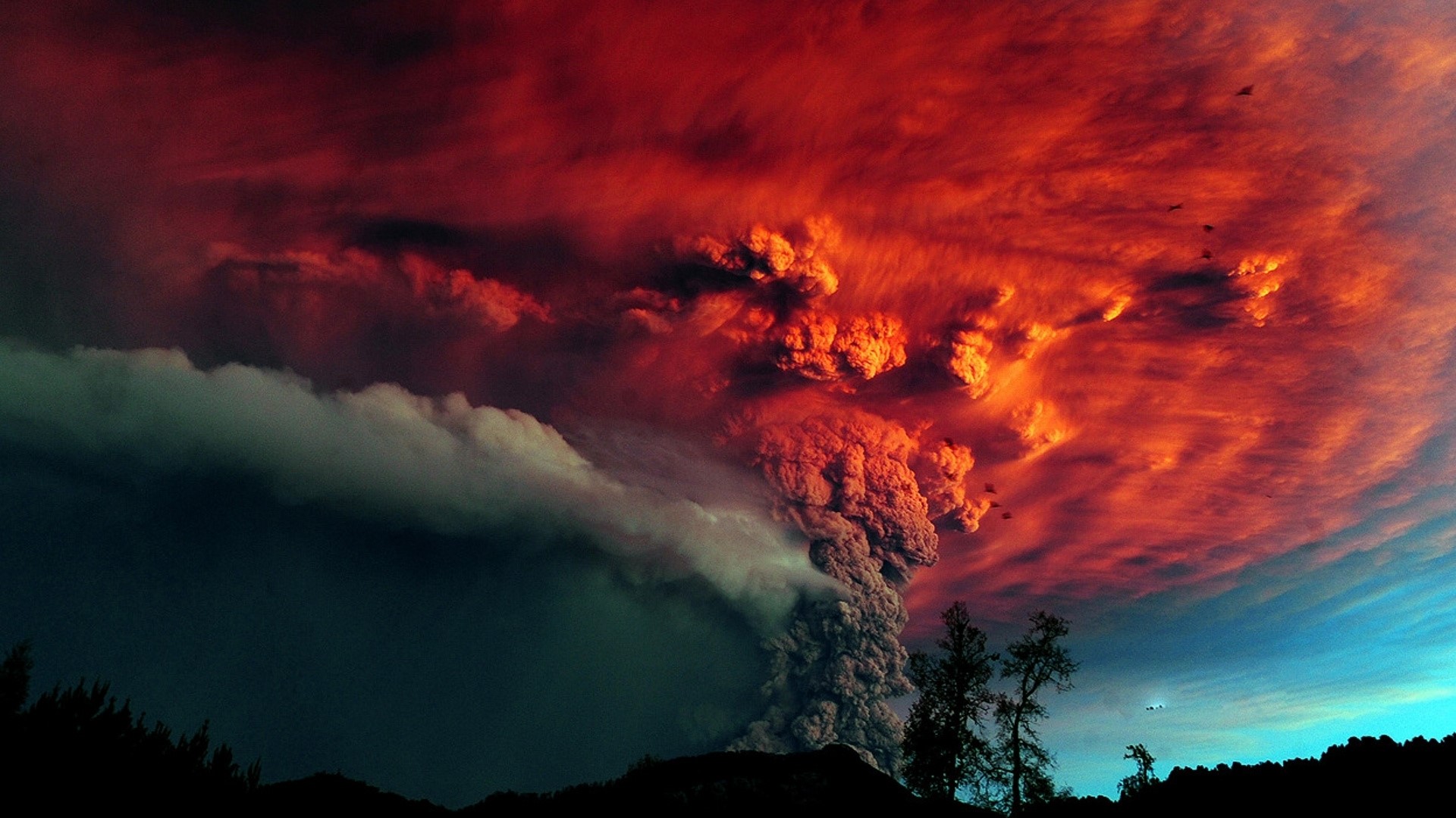 Volcano eruption with red clouds and birds HD Wallpaper
