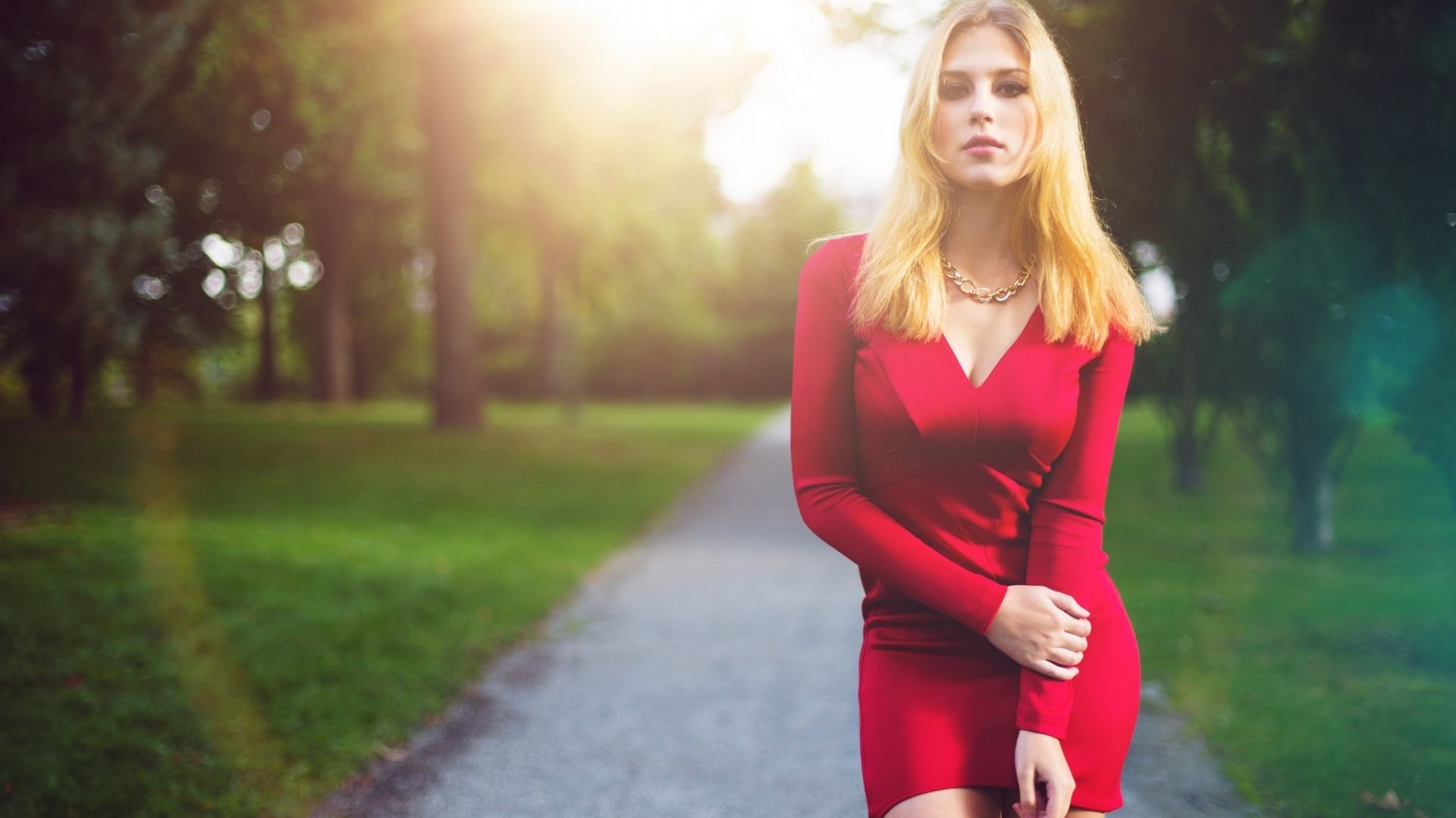 Woman in red dress in park HD Wallpaper