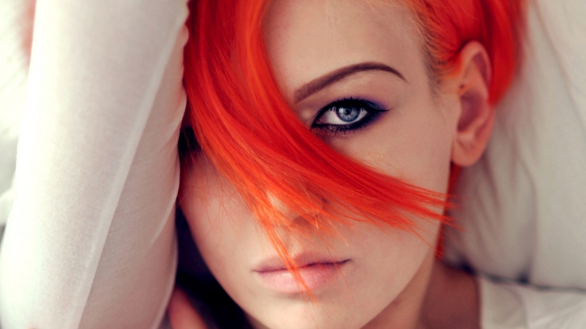 Woman with bright orange hair and blue eyes HD Wallpaper