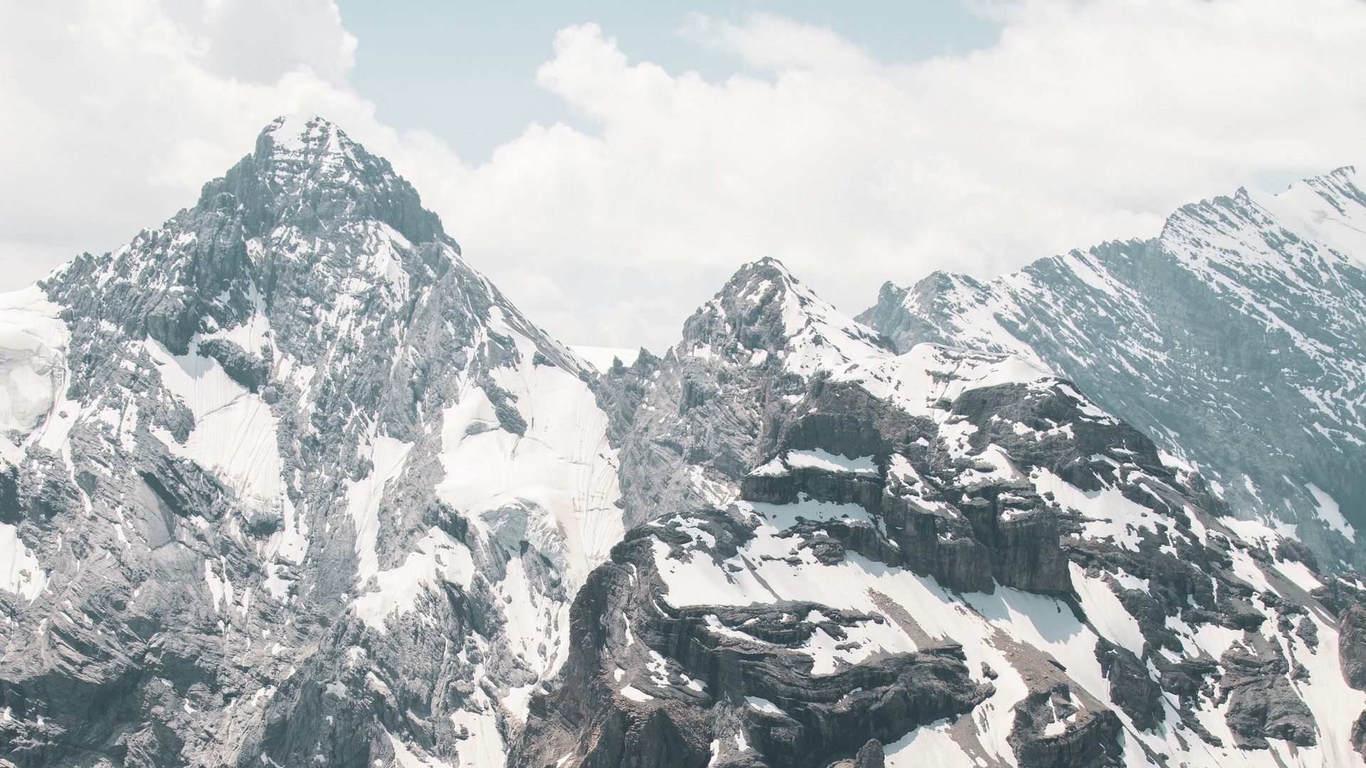 Snow-covered mountains in Switzerland HD Wallpaper