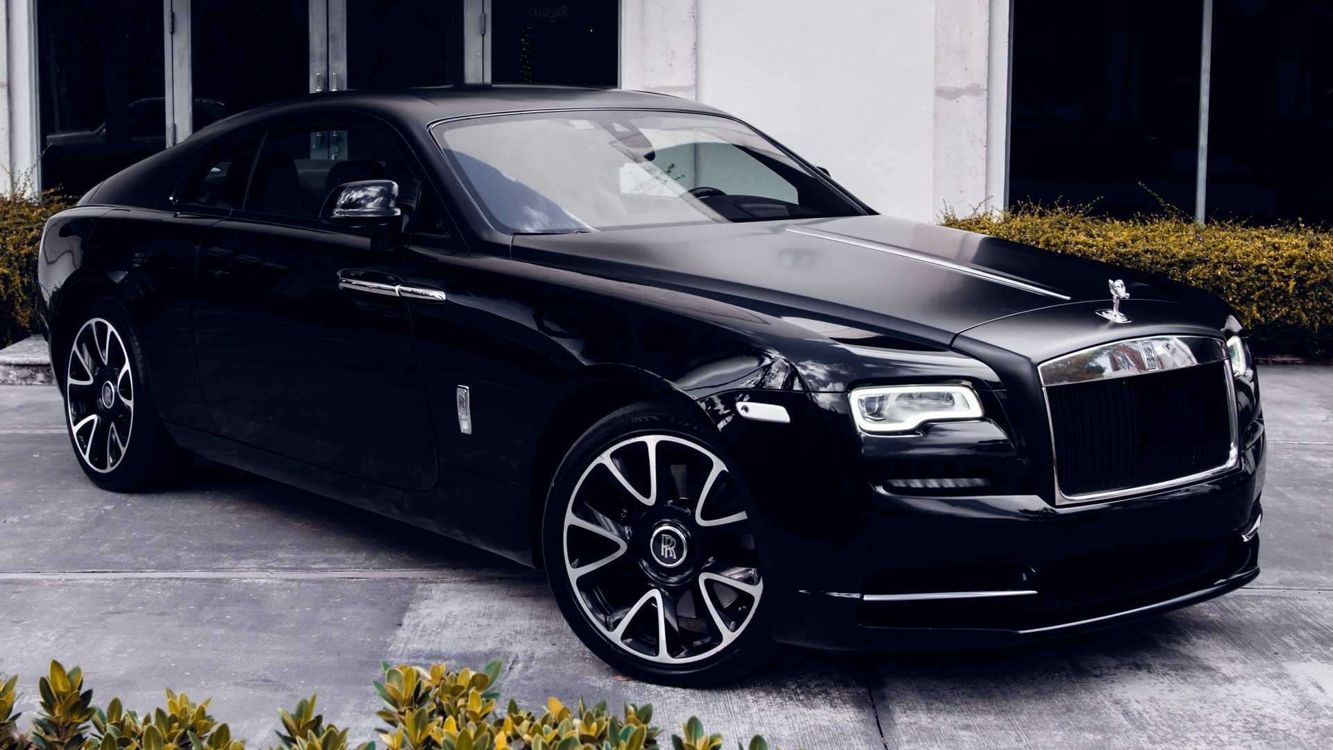 Black Rolls-Royce Coupe parked outdoors HD Wallpaper