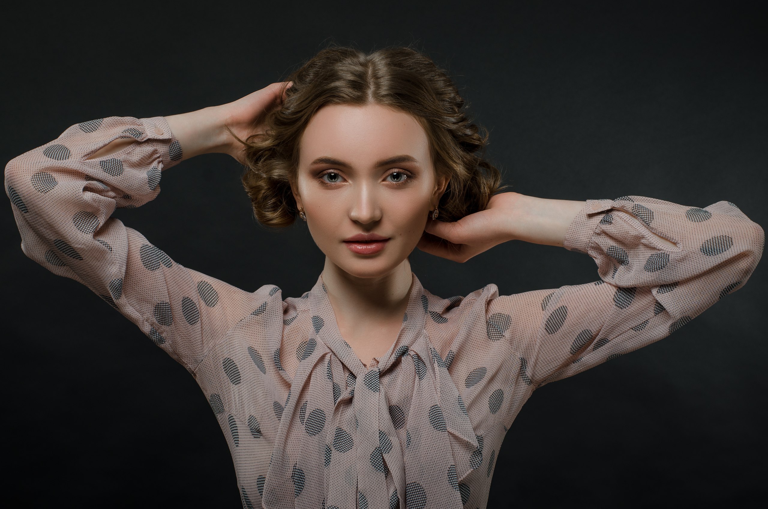 Woman with hands in hair HD Wallpaper