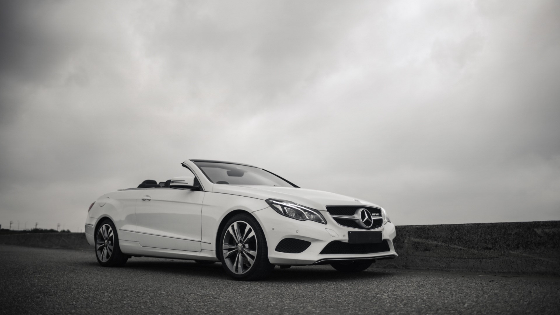 White Mercedes-Benz E200 Convertible on a Cloudy Day HD Wallpaper