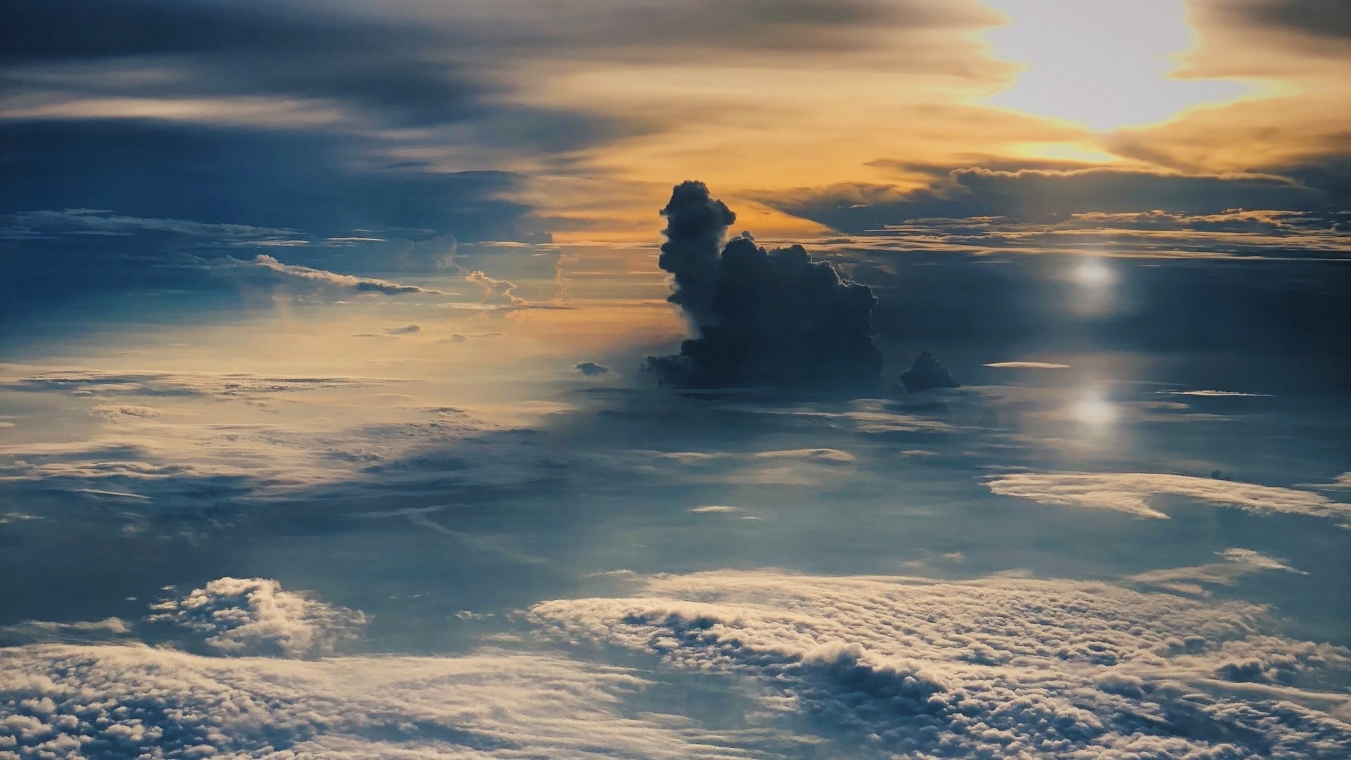 Clouds at sunset from above HD Wallpaper