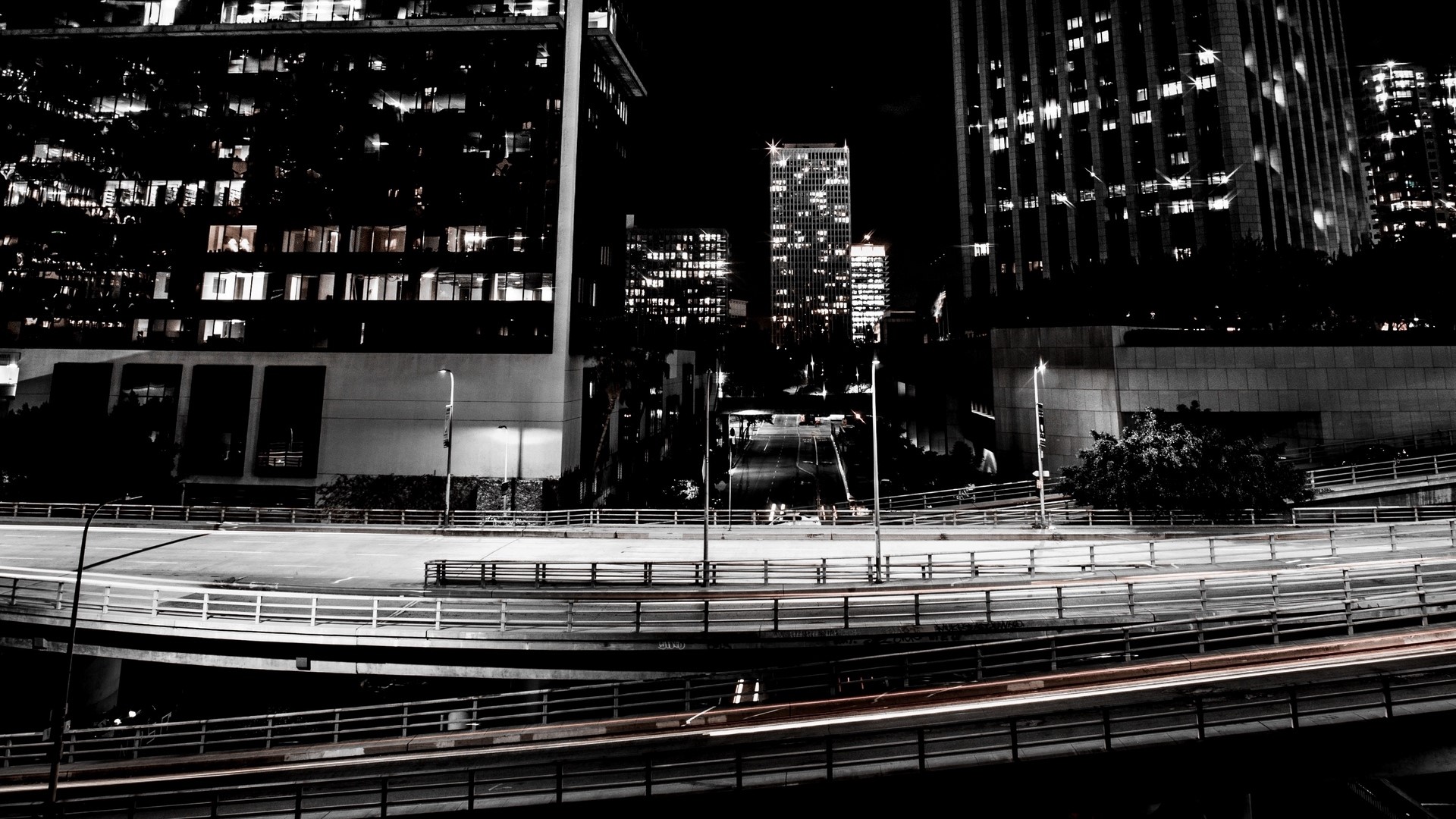 Night highway with city buildings HD Wallpaper